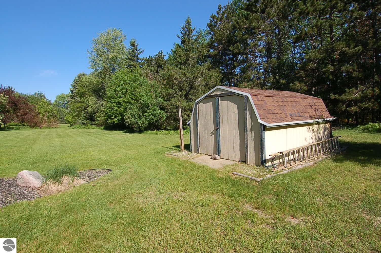 134 Doral Drive, Cadillac, MI 48640 — Photo 21