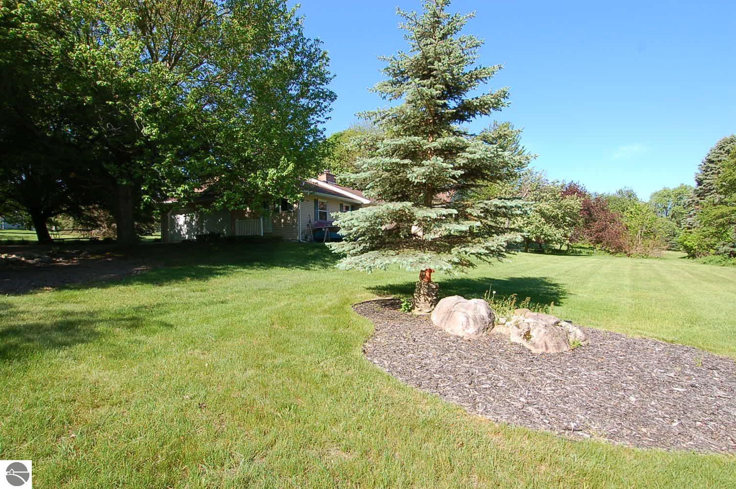 134 Doral Drive, Cadillac, MI 48640 — Photo 23