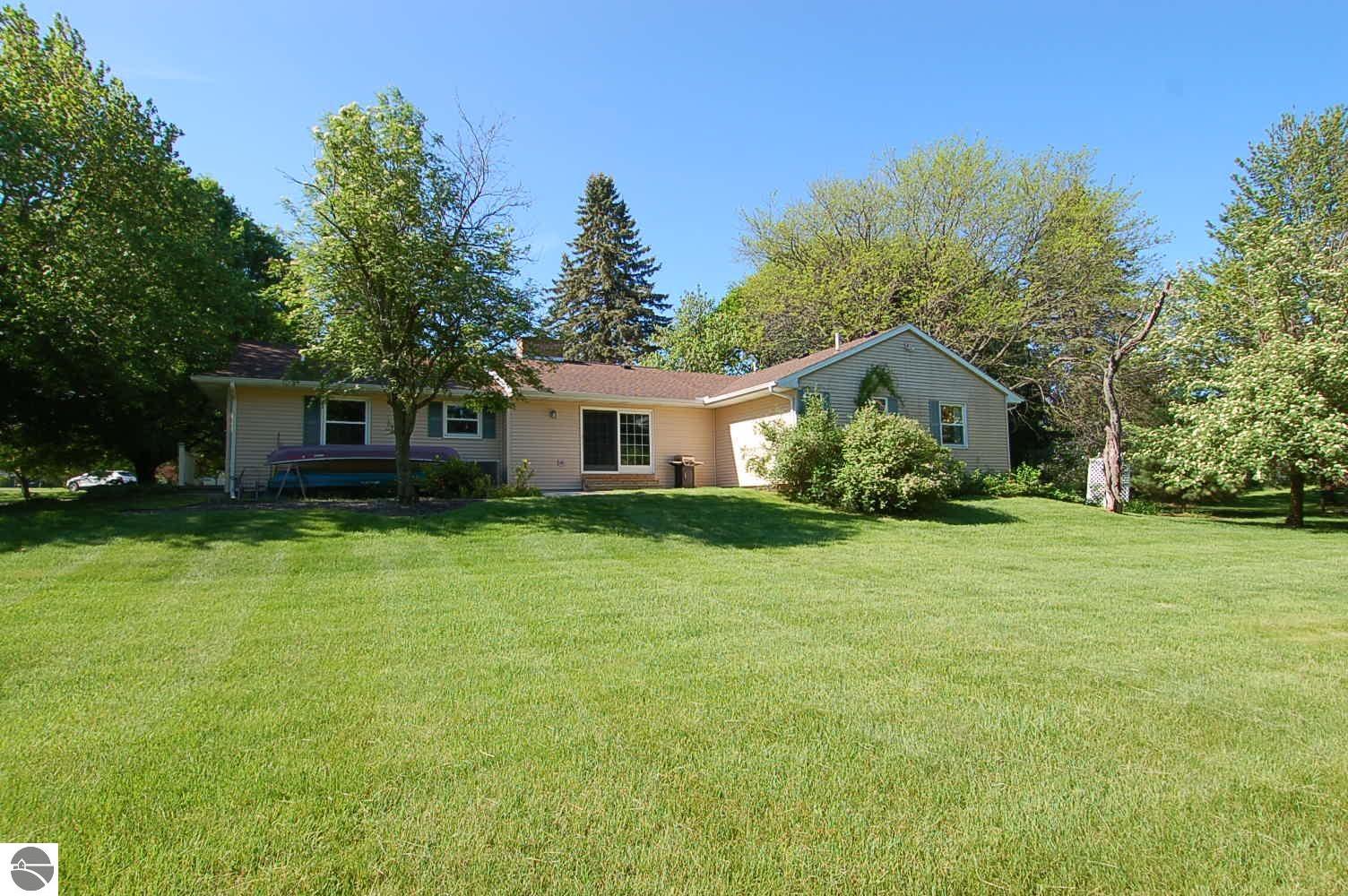 134 Doral Drive, Cadillac, MI 48640 — Photo 27