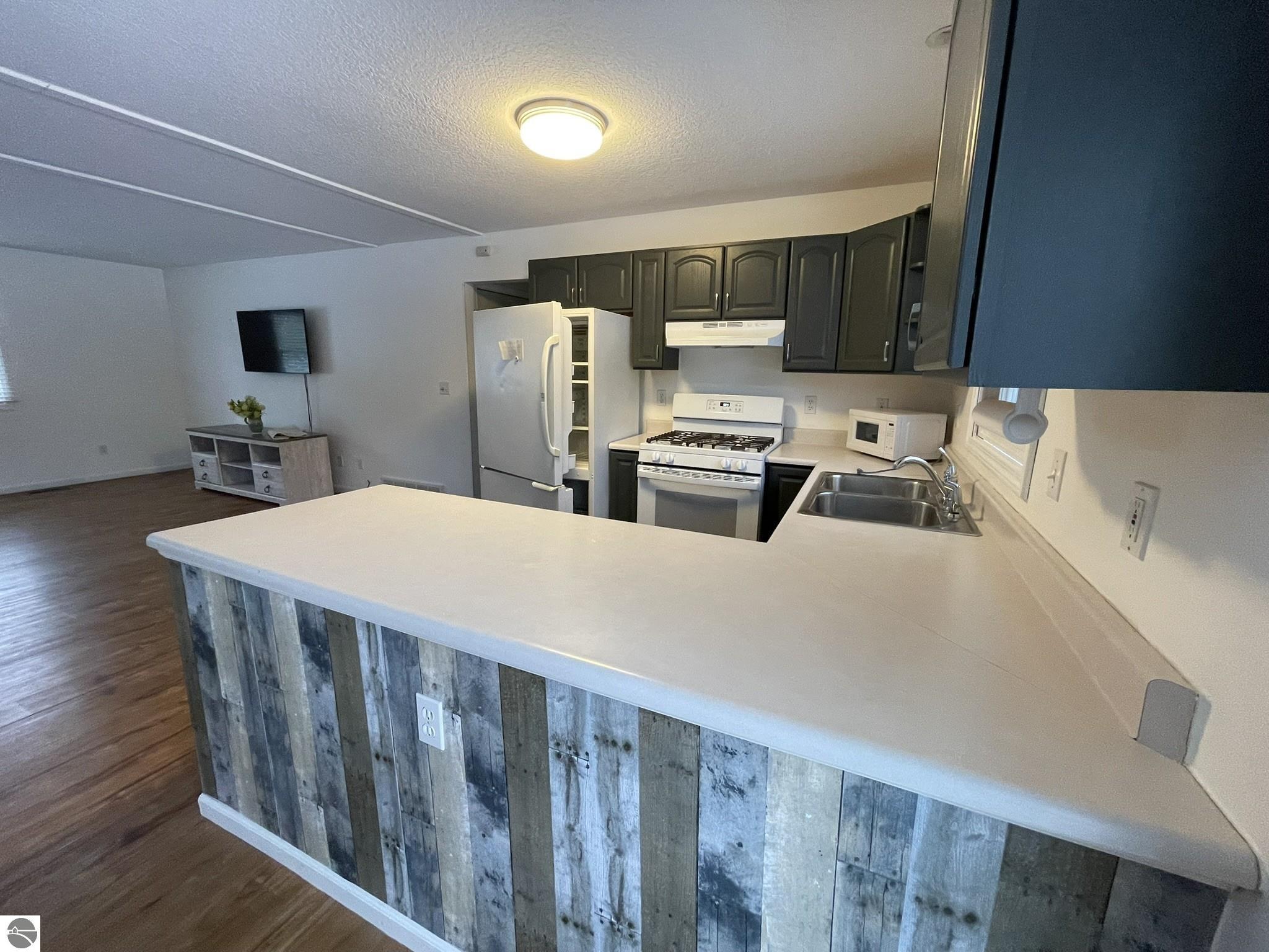 10511 Lake Of The Woods Road, Alden, MI 49612 — Photo 11
