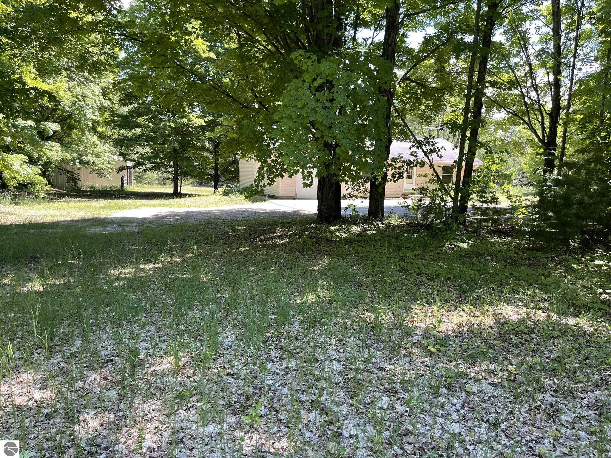 10511 Lake Of The Woods Road, Alden, MI 49612 — Photo 37