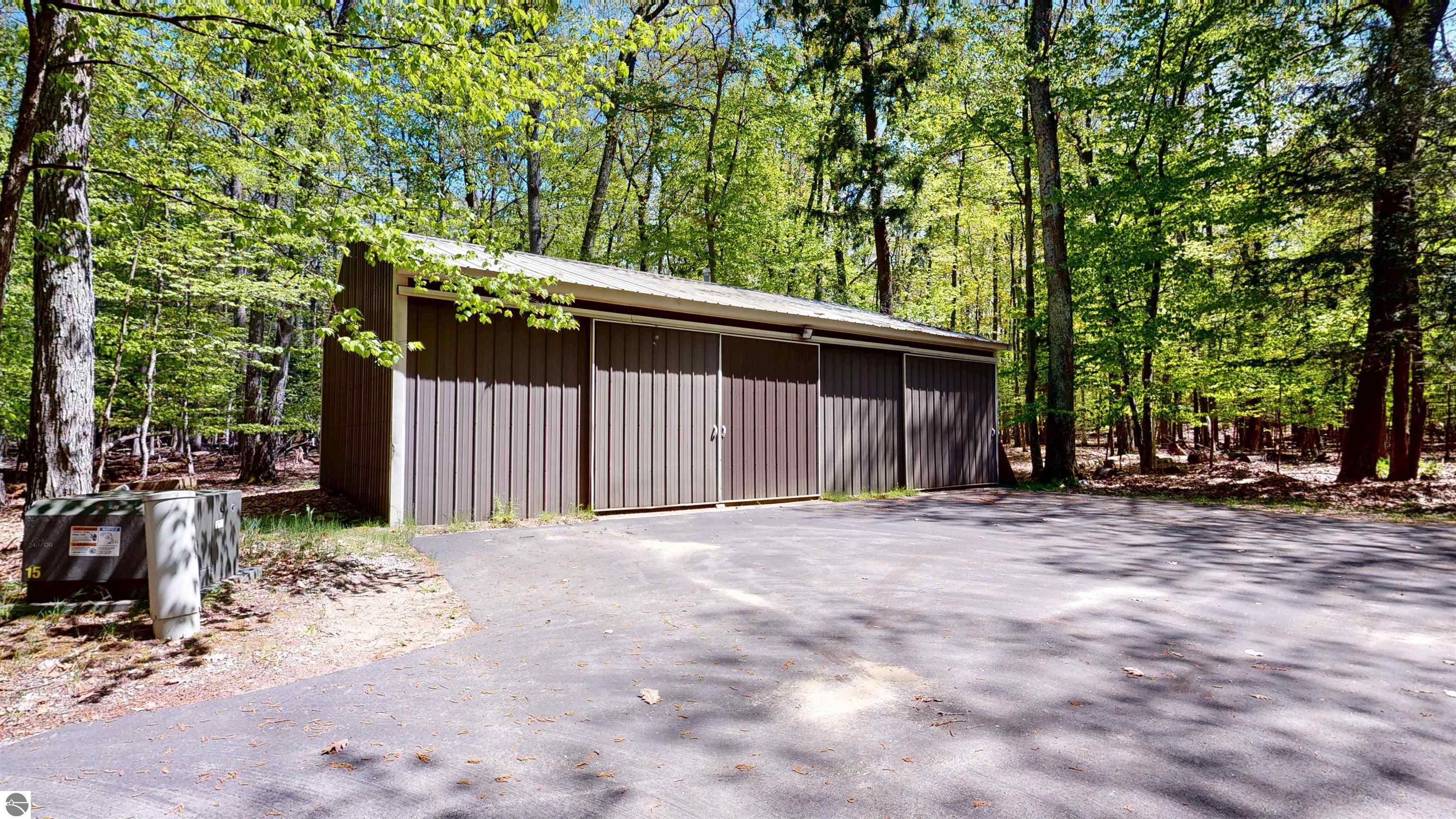 8645 Skegemog Point Road, Williamsburg, MI 49690 — Photo 20