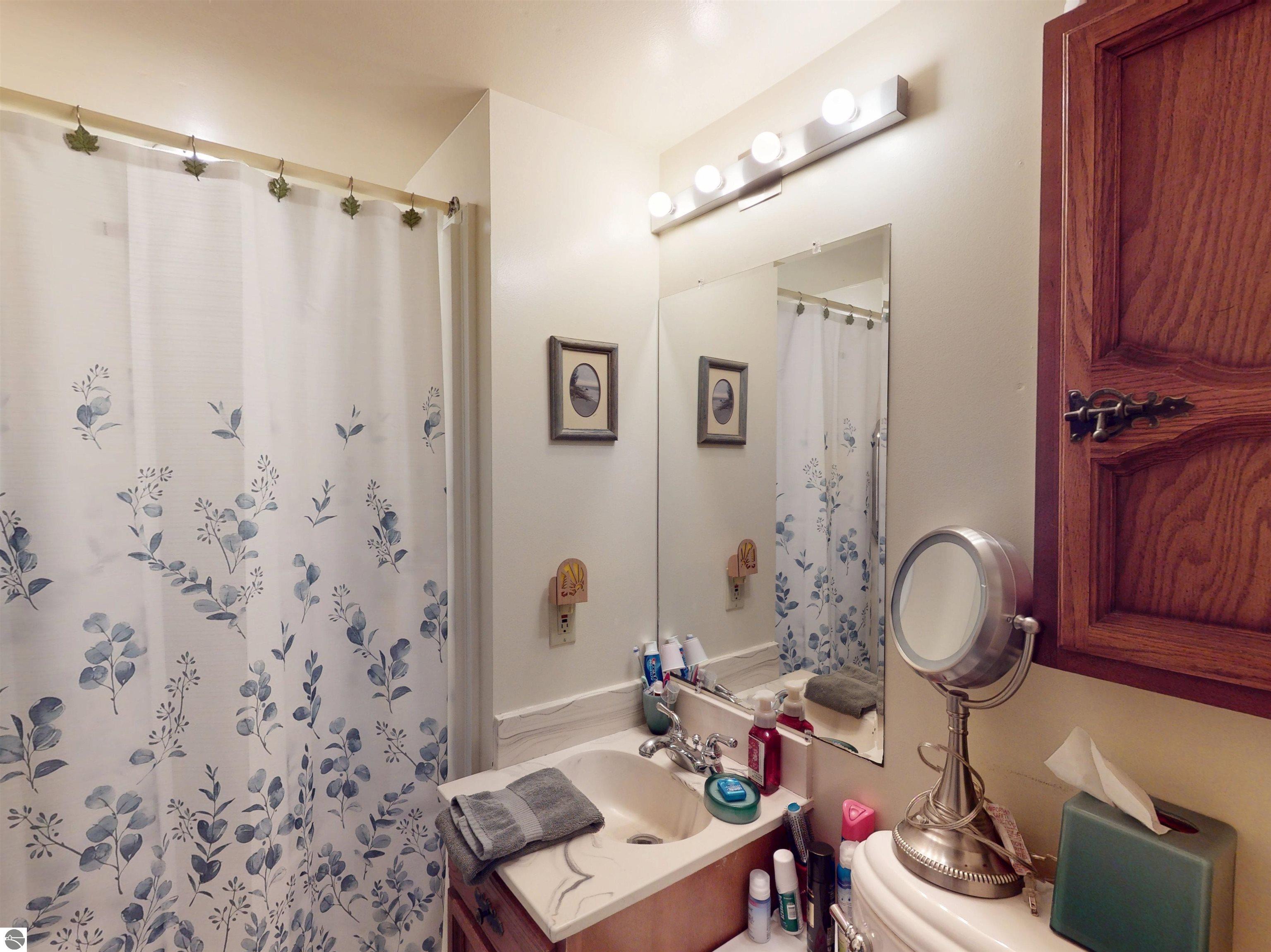 8645 Skegemog Point Road, Williamsburg, MI 49690 — Photo 29