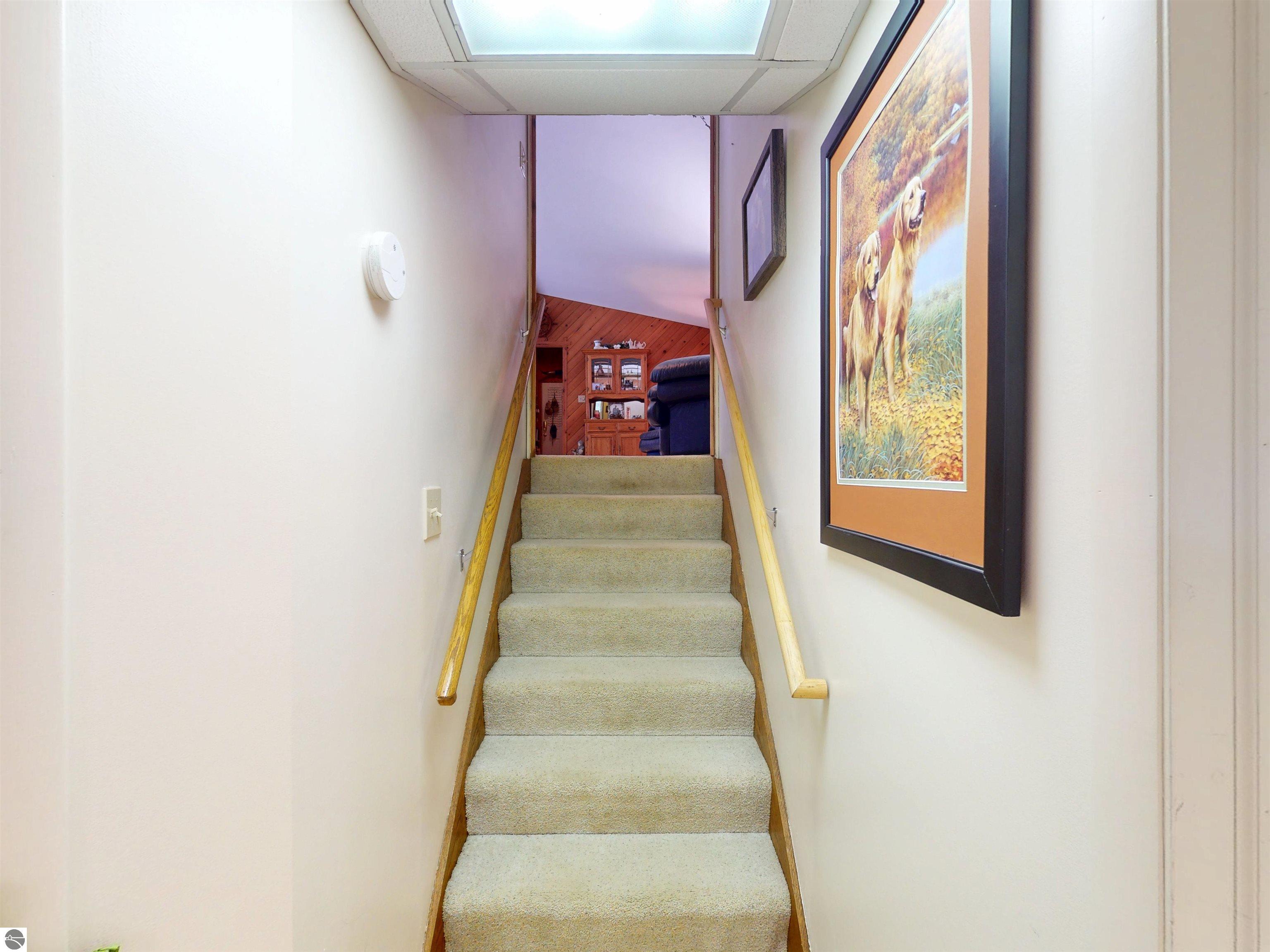 8645 Skegemog Point Road, Williamsburg, MI 49690 — Photo 30