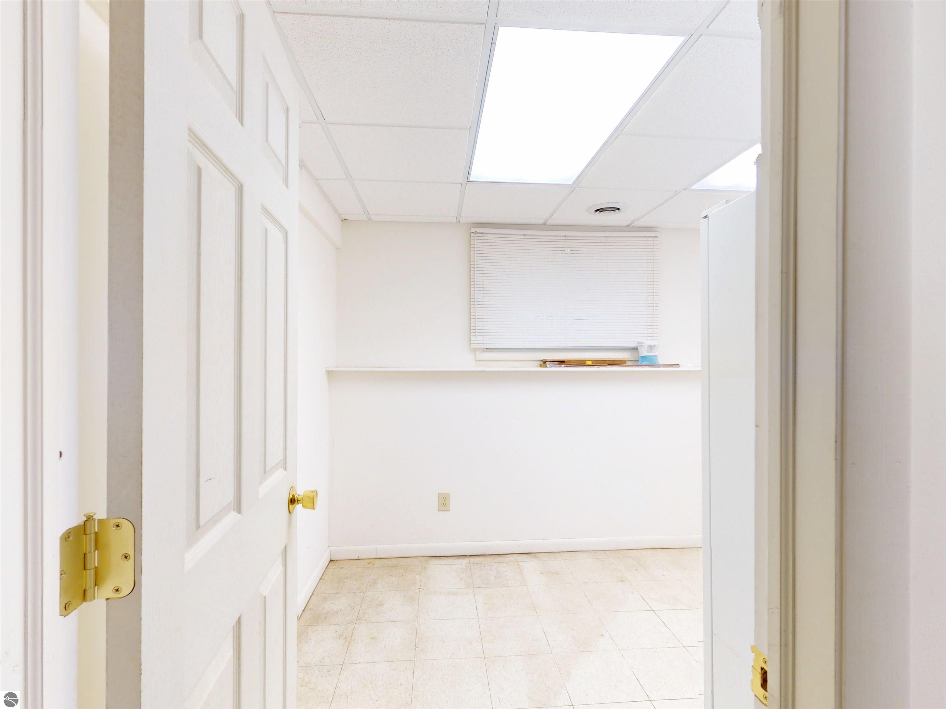 8645 Skegemog Point Road, Williamsburg, MI 49690 — Photo 31