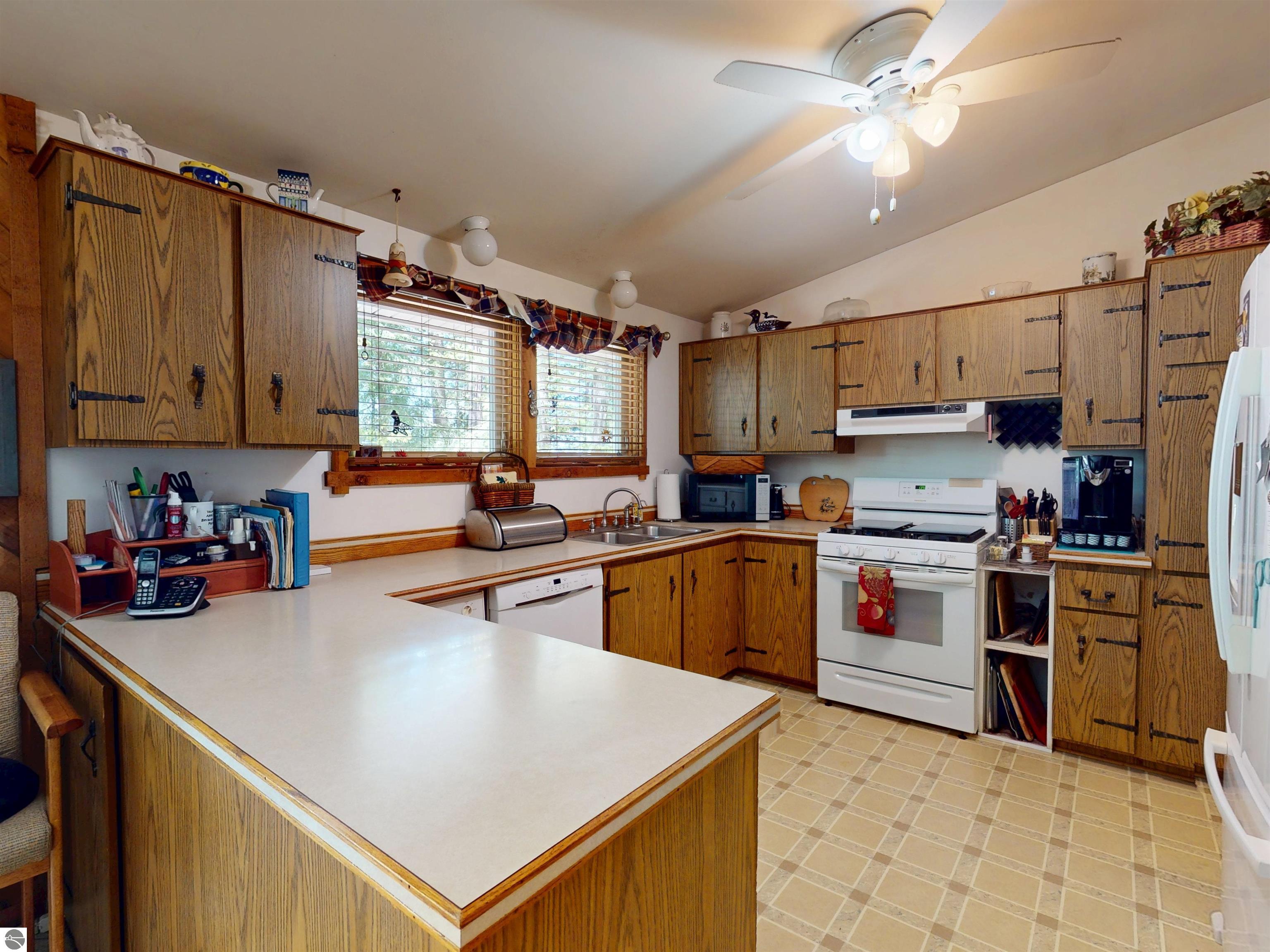 8645 Skegemog Point Road, Williamsburg, MI 49690 — Photo 54