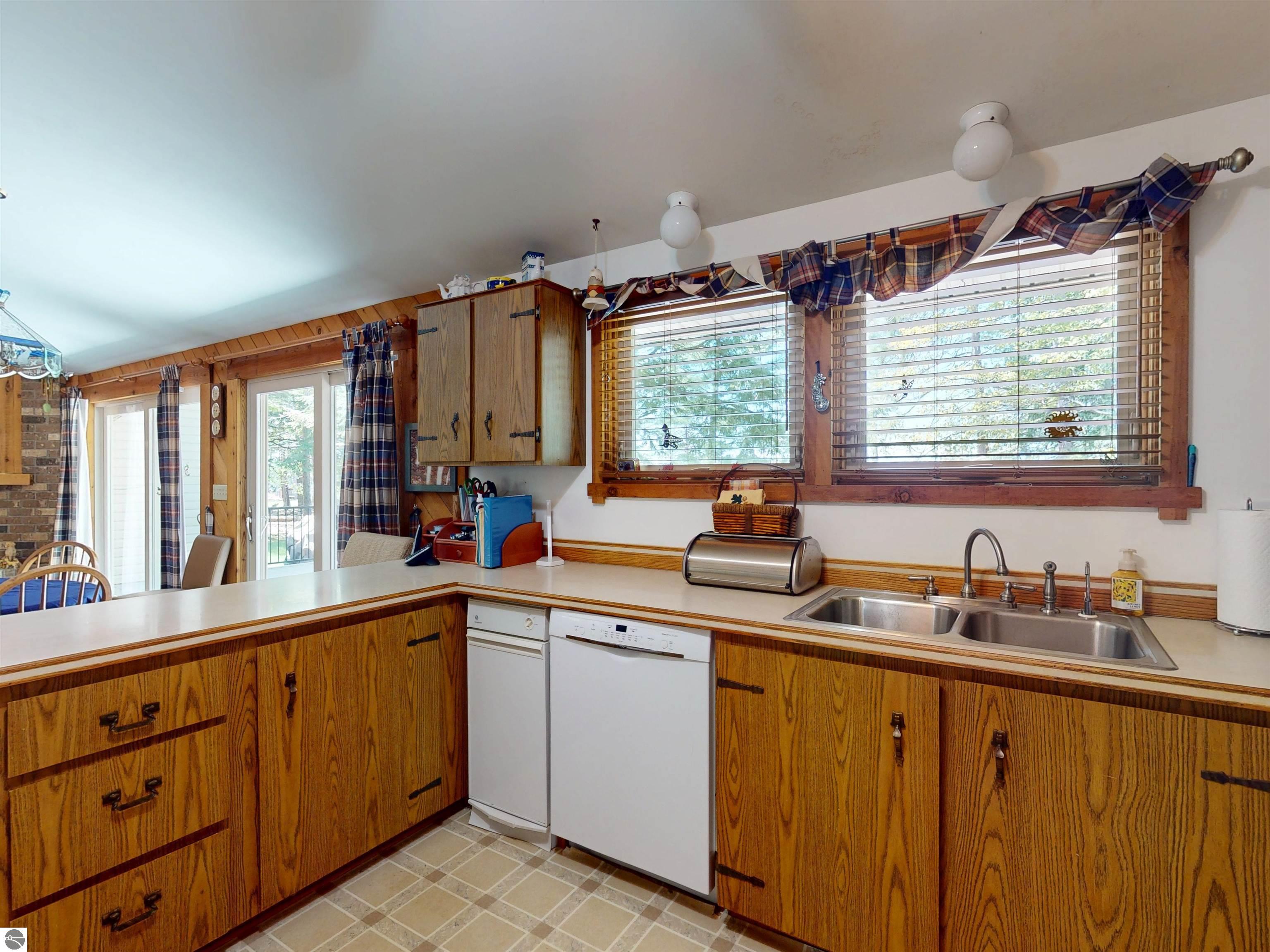 8645 Skegemog Point Road, Williamsburg, MI 49690 — Photo 57