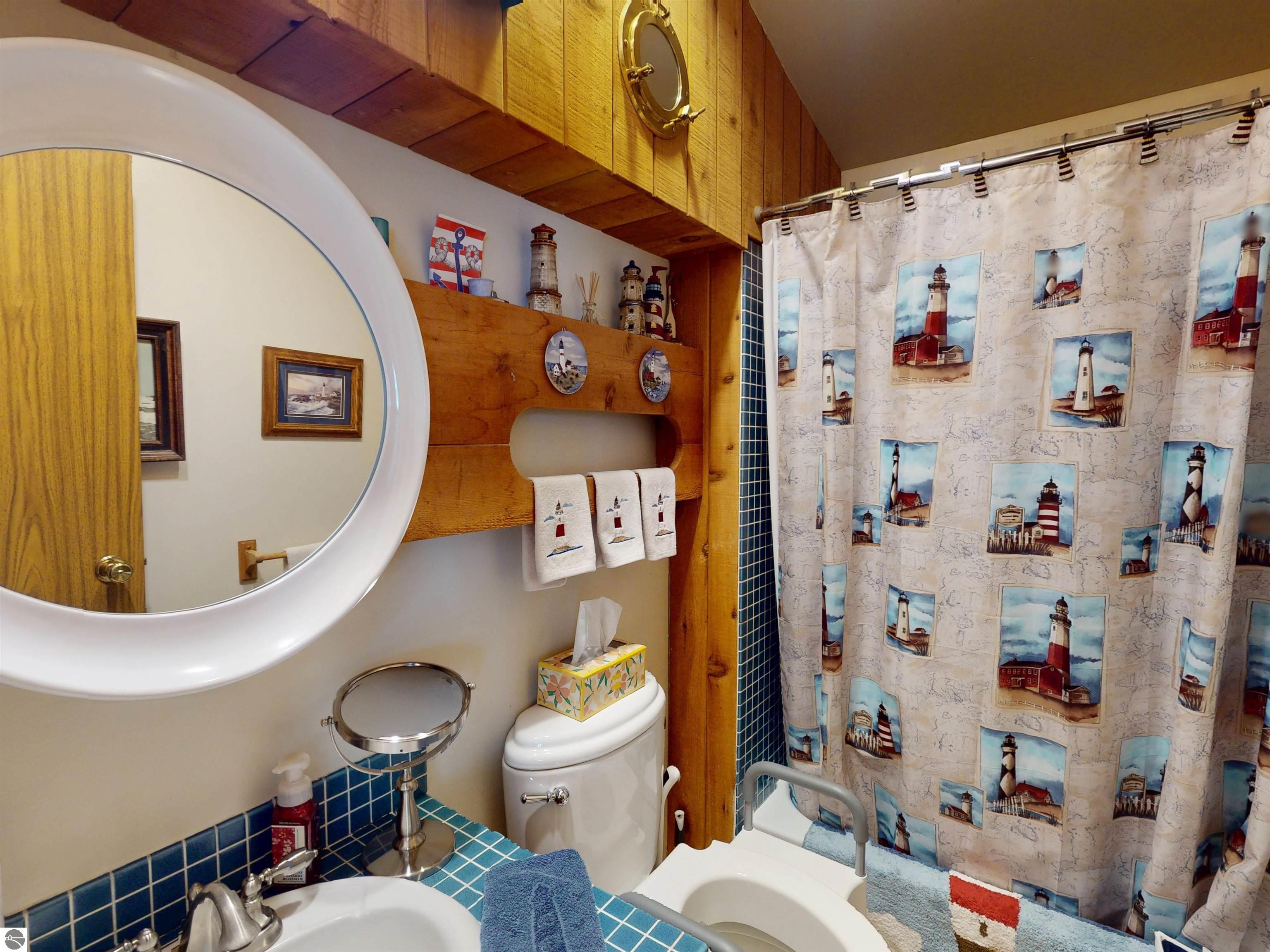 8645 Skegemog Point Road, Williamsburg, MI 49690 — Photo 60
