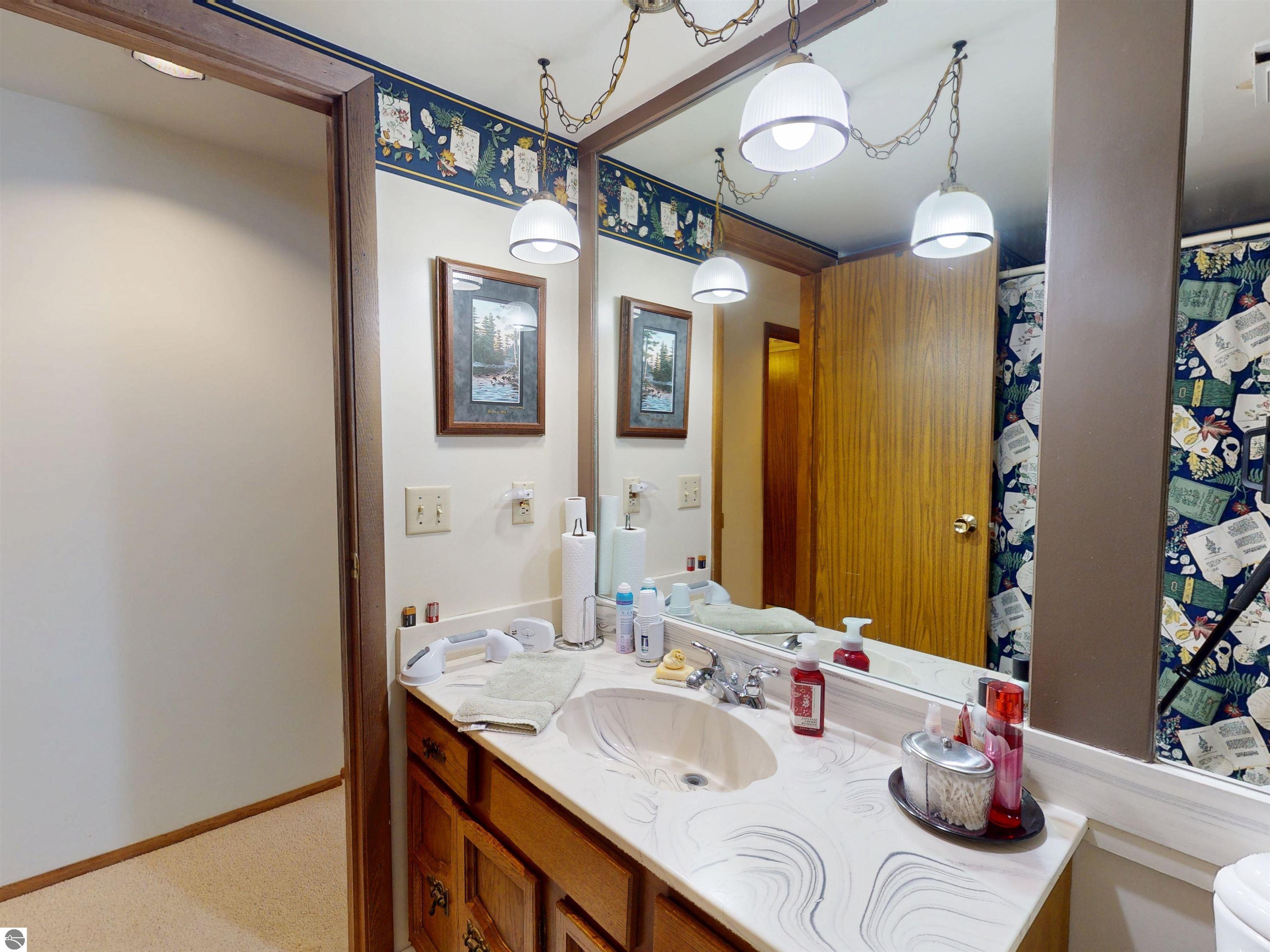 8645 Skegemog Point Road, Williamsburg, MI 49690 — Photo 68