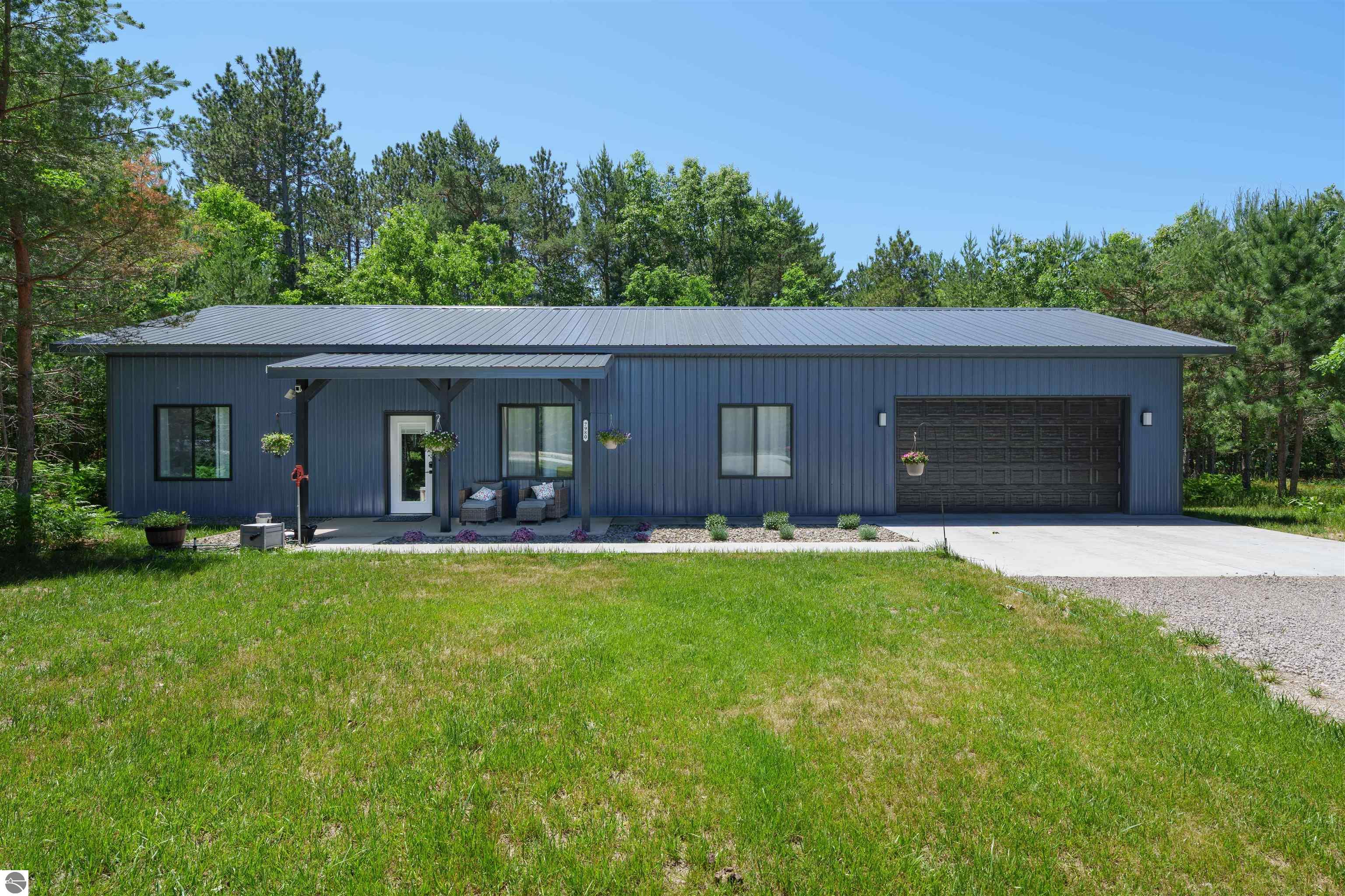8006 Springwater Drive, Rapid City, MI 49676