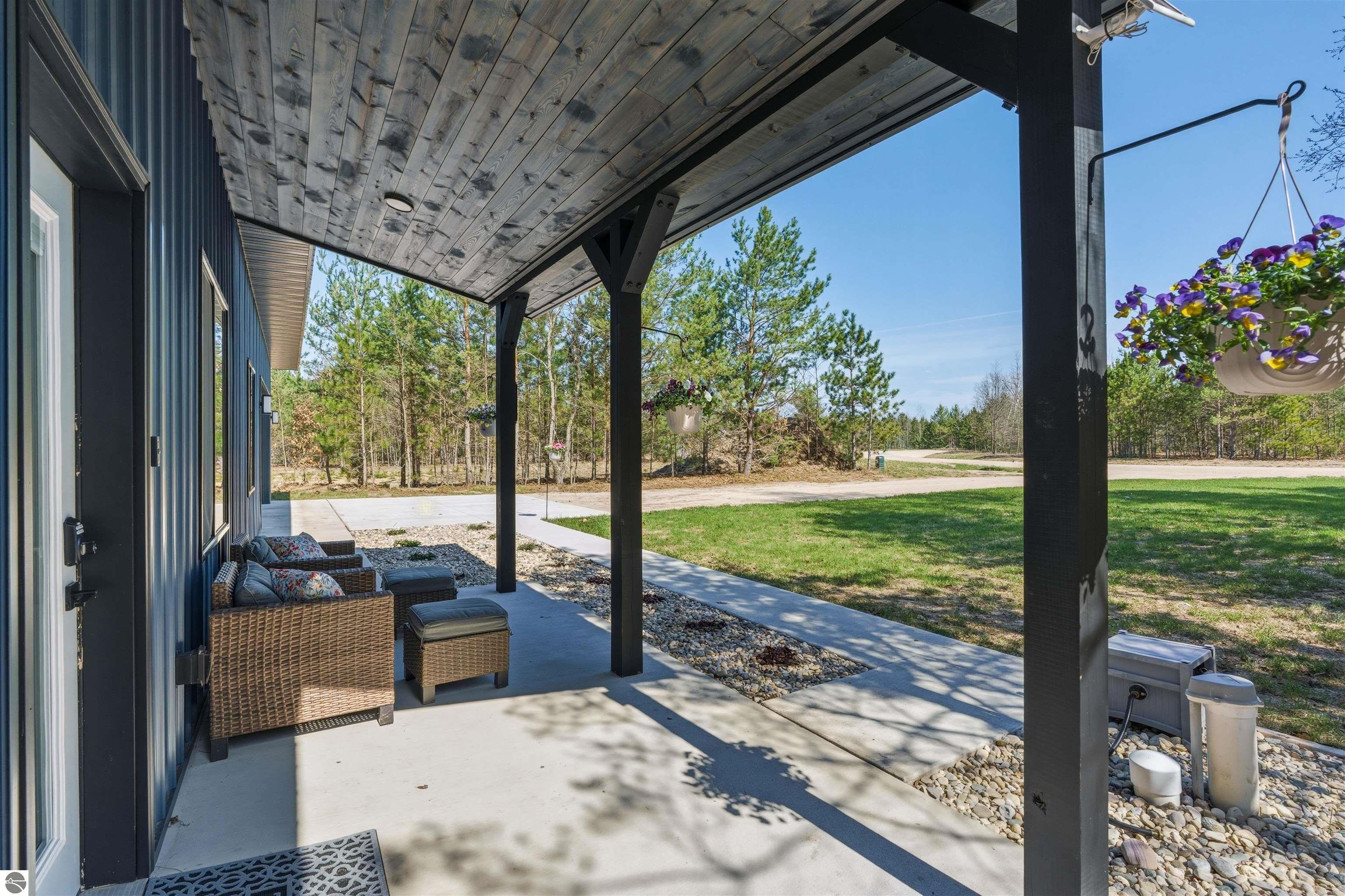 8006 Springwater Drive, Rapid City, MI 49676 — Photo 11