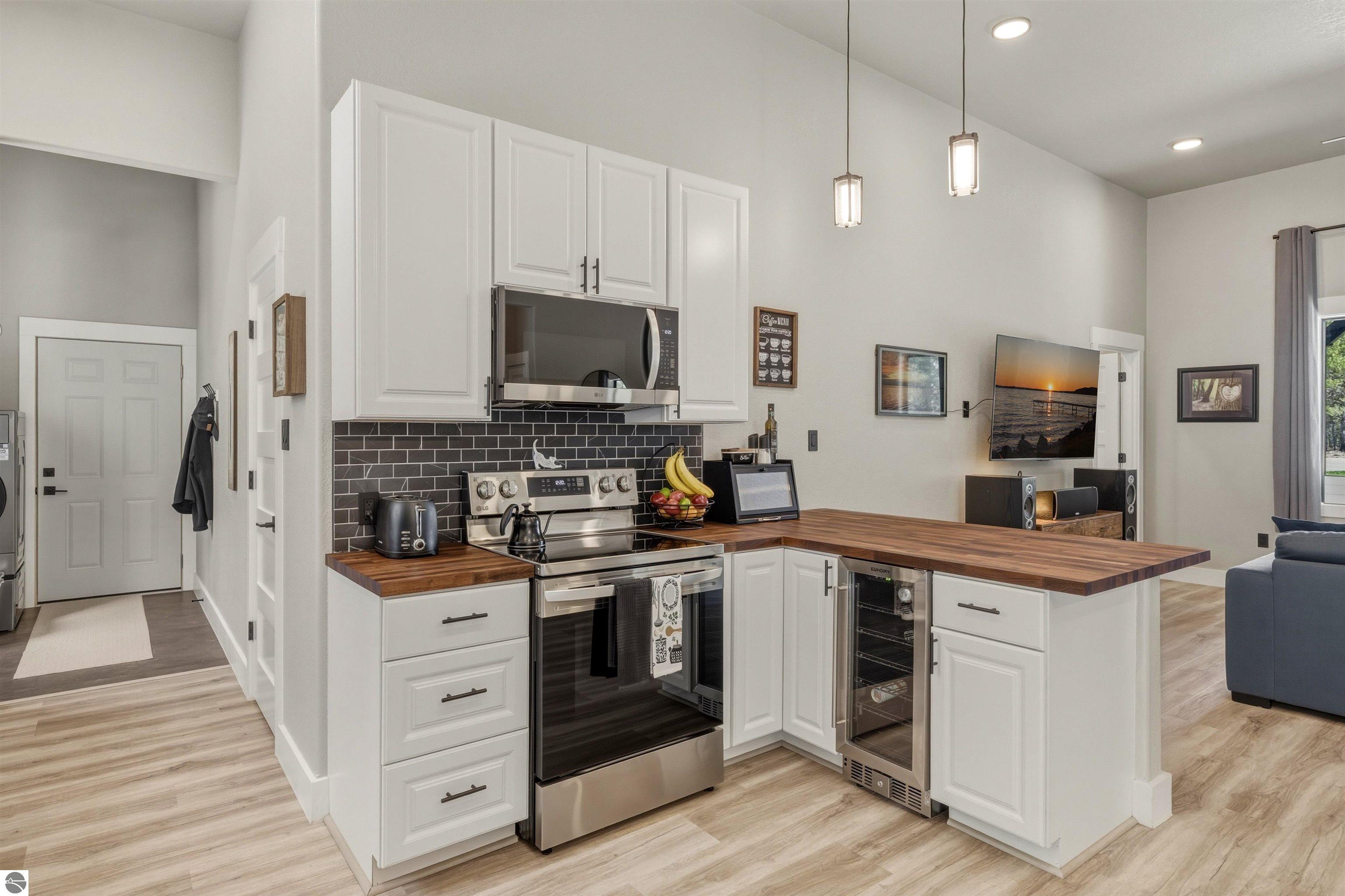 8006 Springwater Drive, Rapid City, MI 49676 — Photo 14