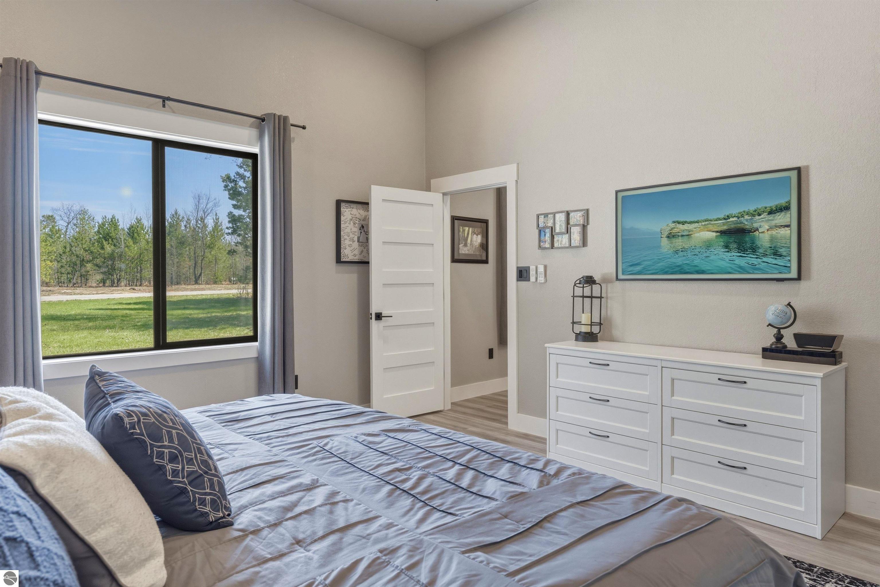 8006 Springwater Drive, Rapid City, MI 49676 — Photo 29