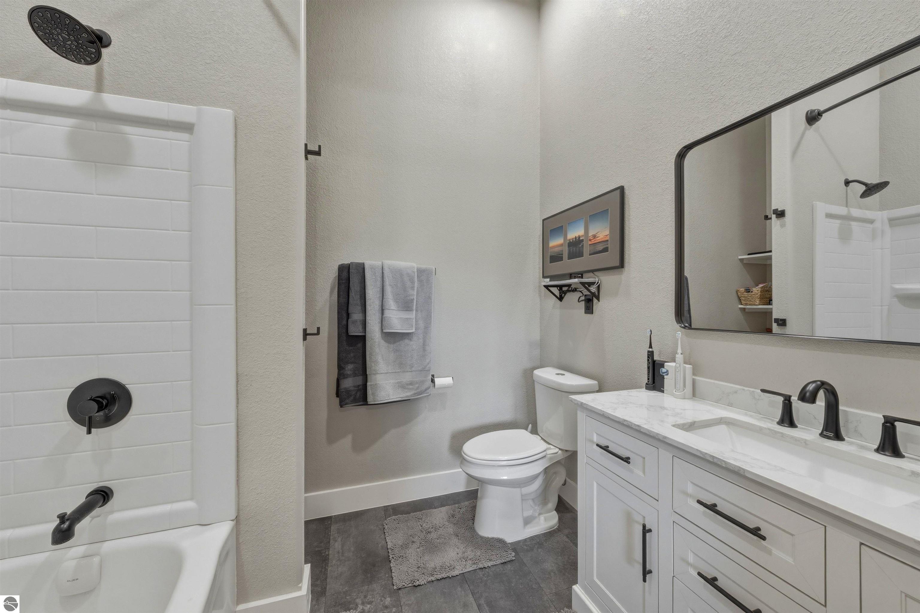 8006 Springwater Drive, Rapid City, MI 49676 — Photo 31