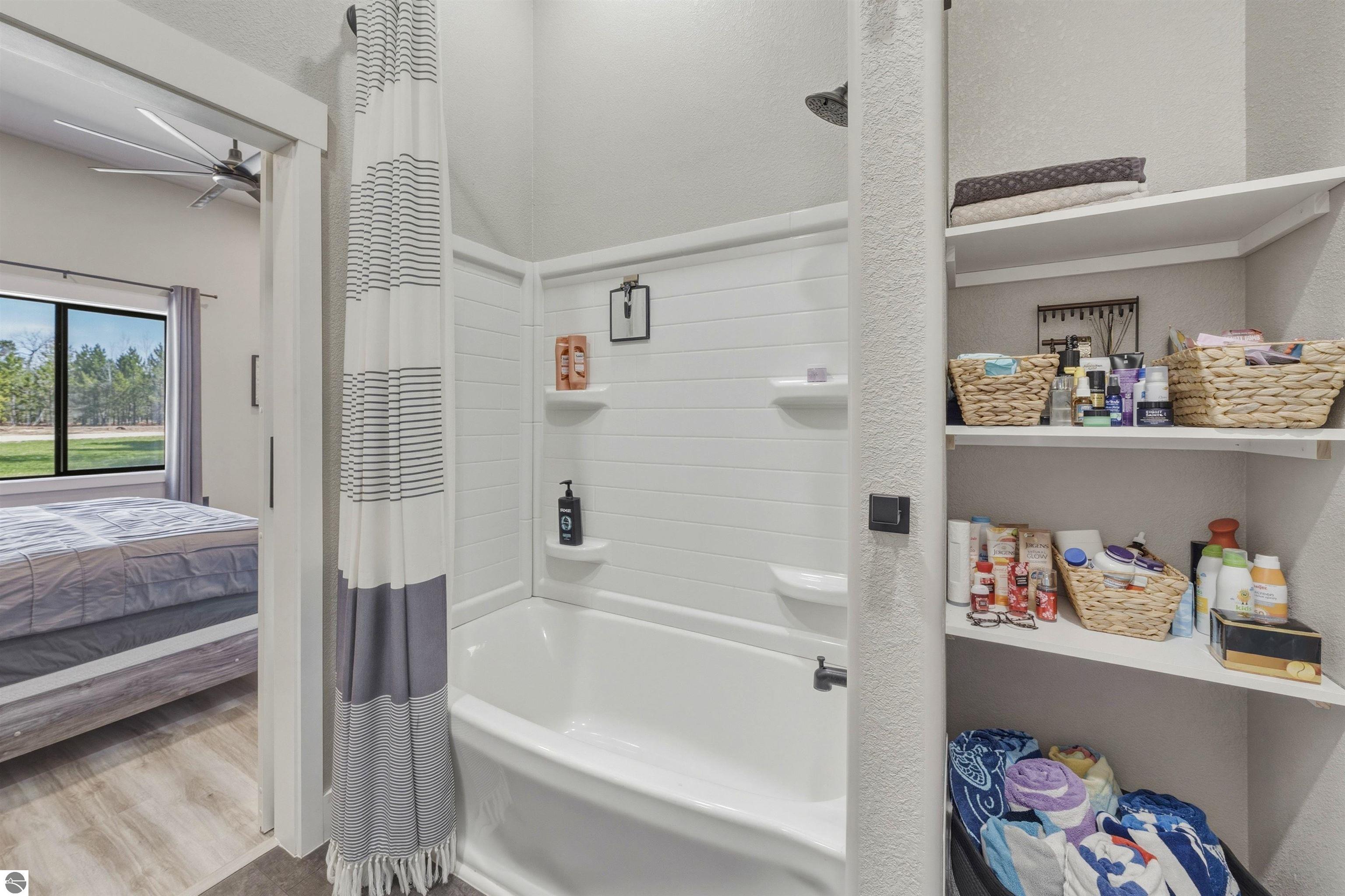 8006 Springwater Drive, Rapid City, MI 49676 — Photo 32