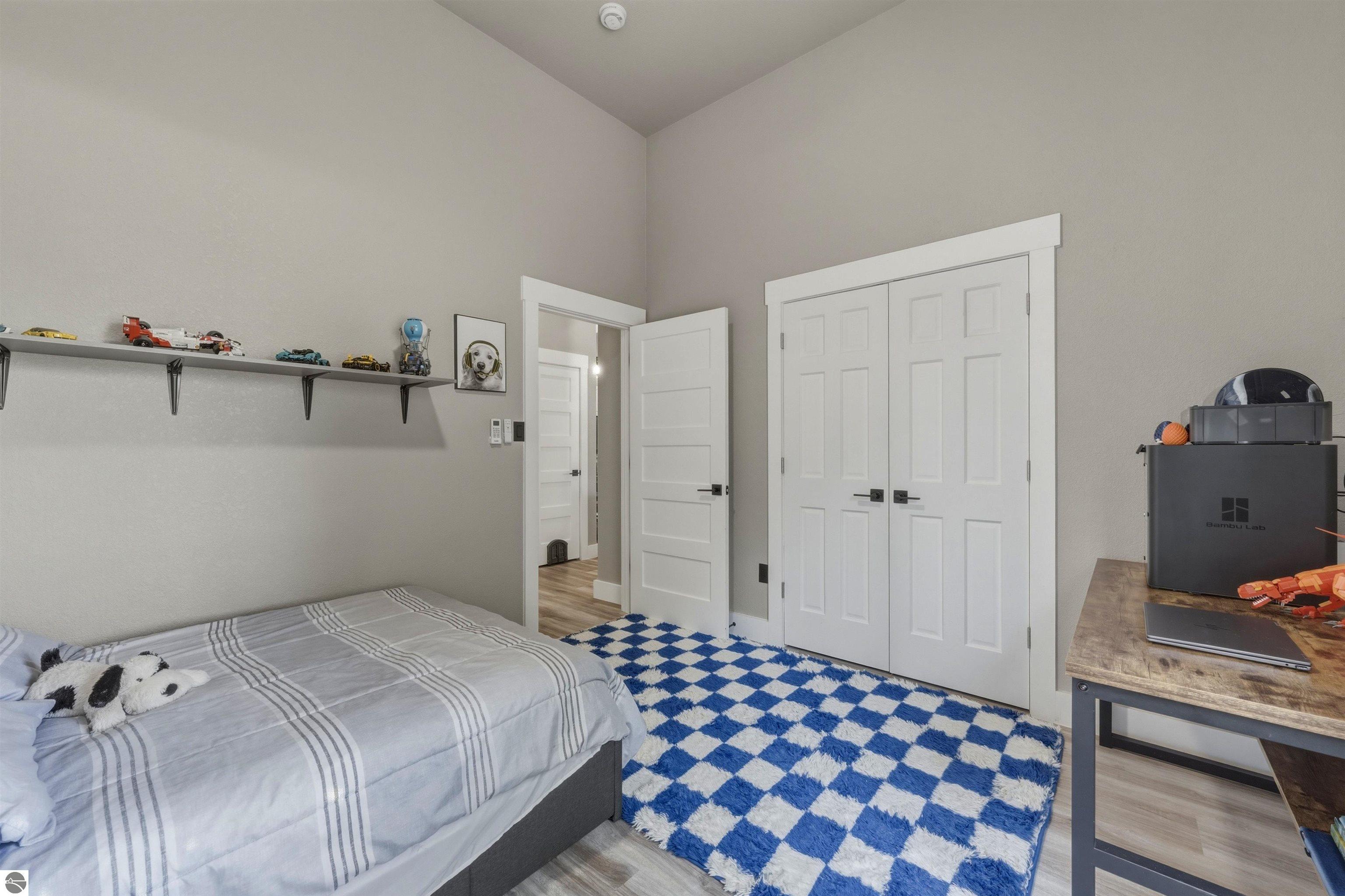 8006 Springwater Drive, Rapid City, MI 49676 — Photo 35