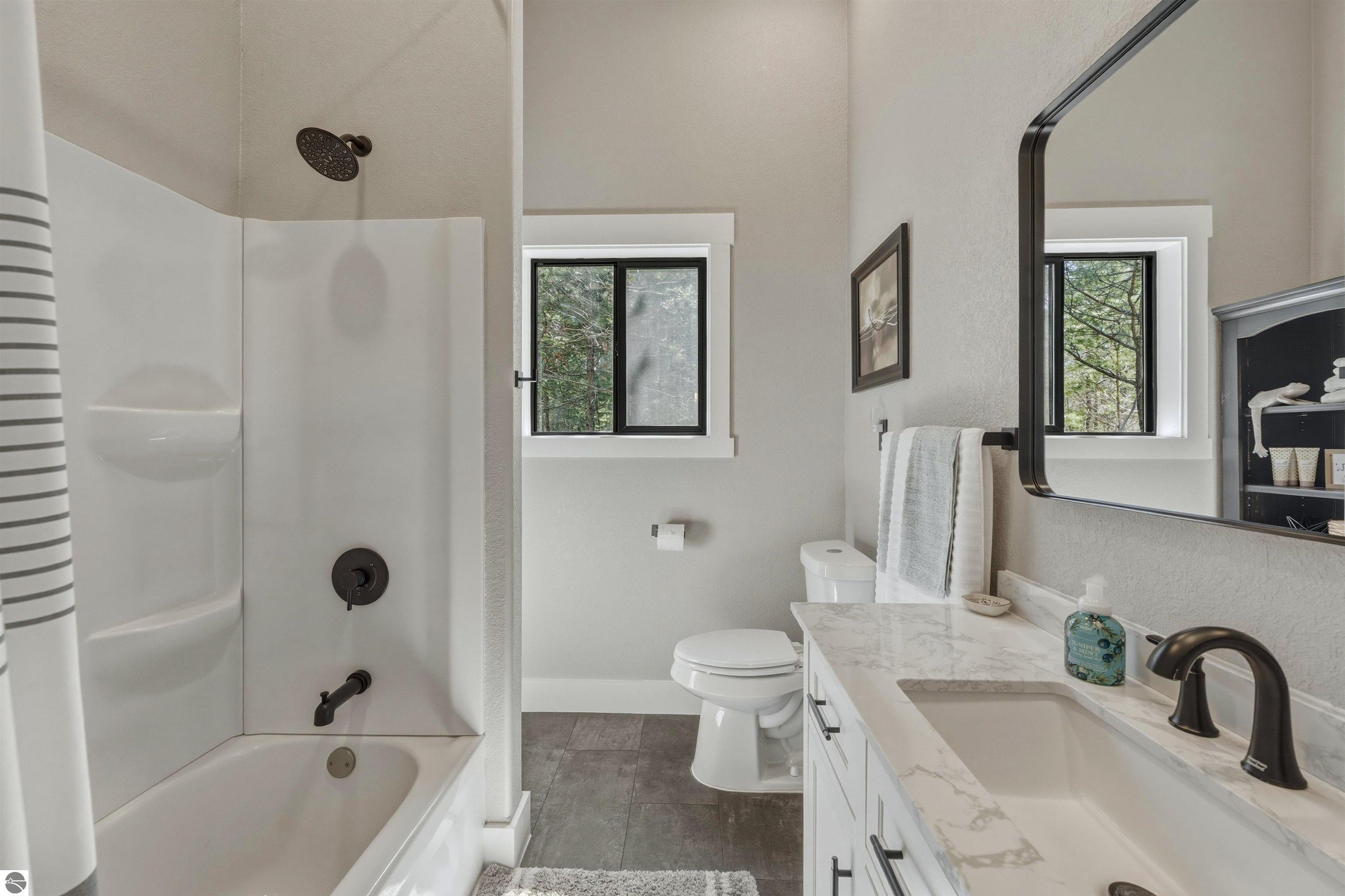 8006 Springwater Drive, Rapid City, MI 49676 — Photo 37