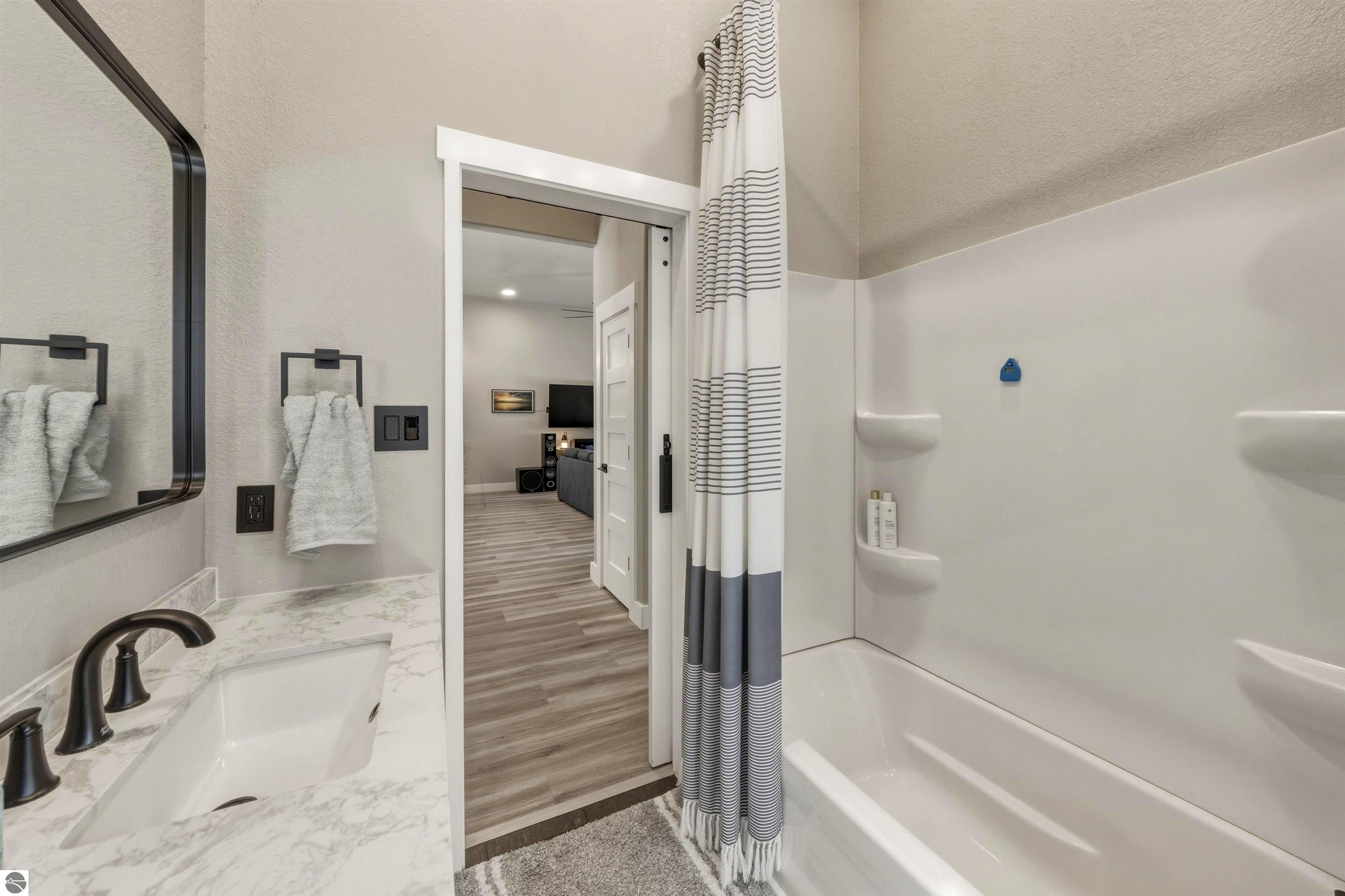 8006 Springwater Drive, Rapid City, MI 49676 — Photo 38