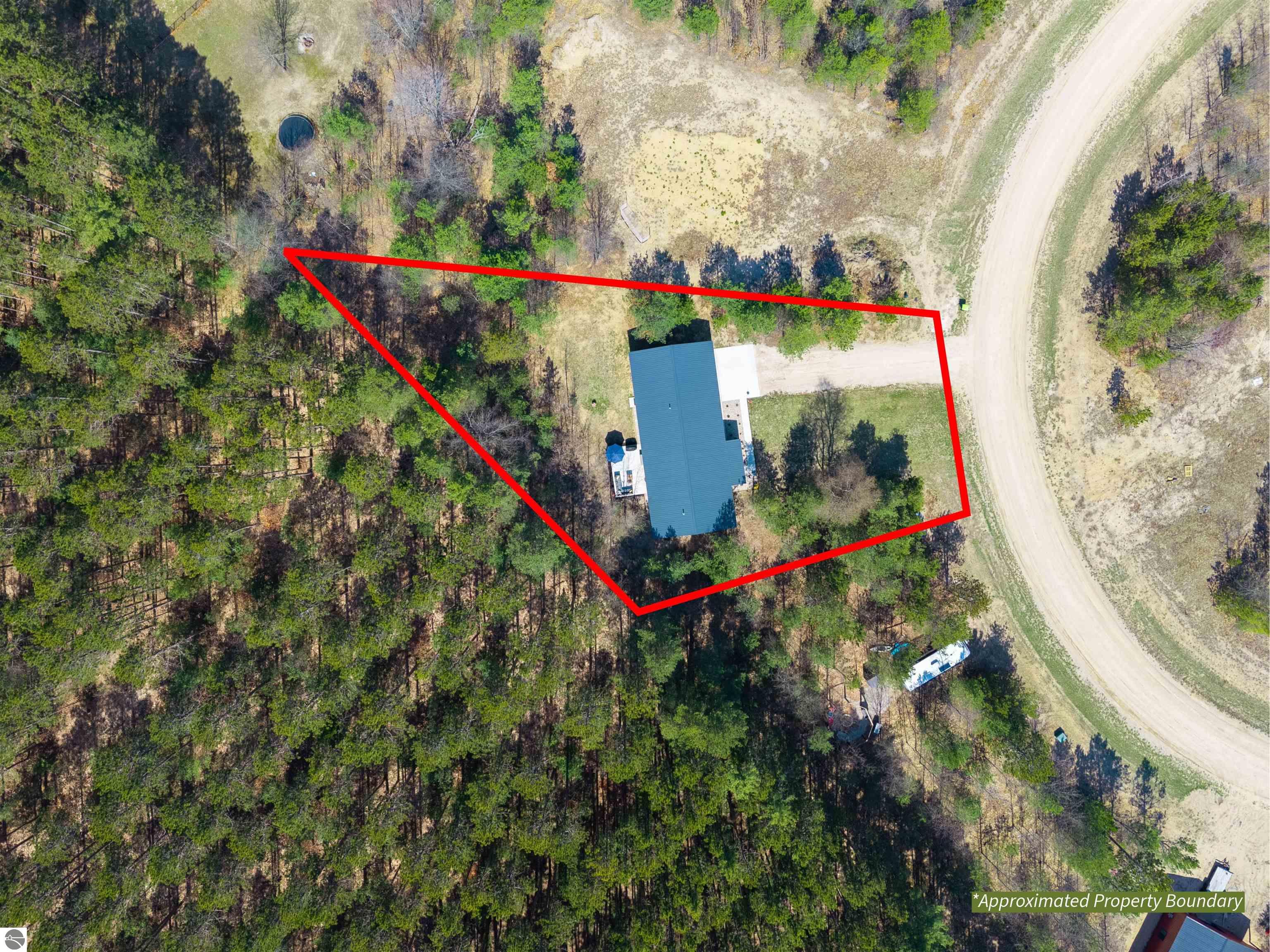 8006 Springwater Drive, Rapid City, MI 49676 — Photo 45
