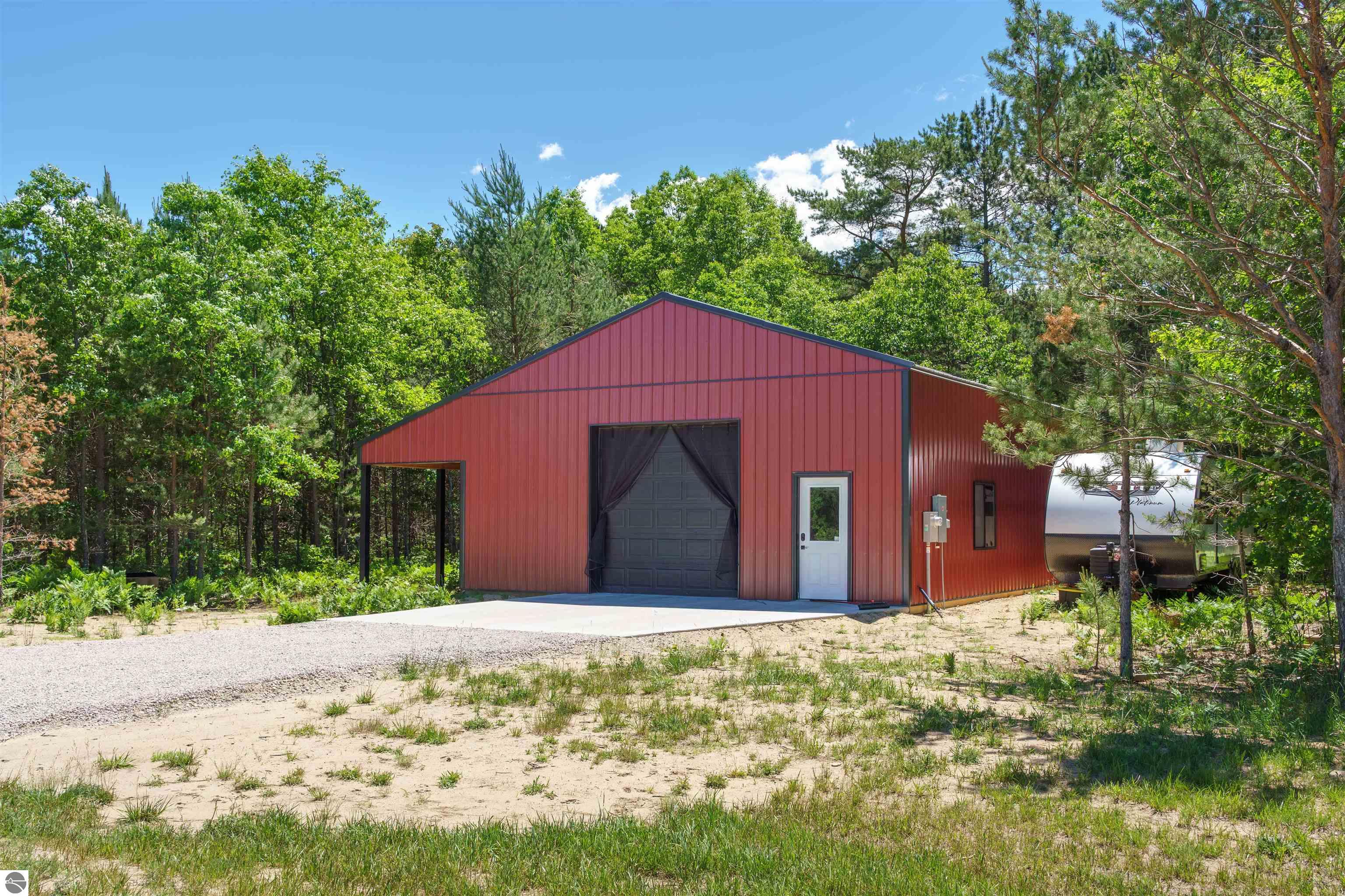 8006 Springwater Drive, Rapid City, MI 49676 — Photo 47