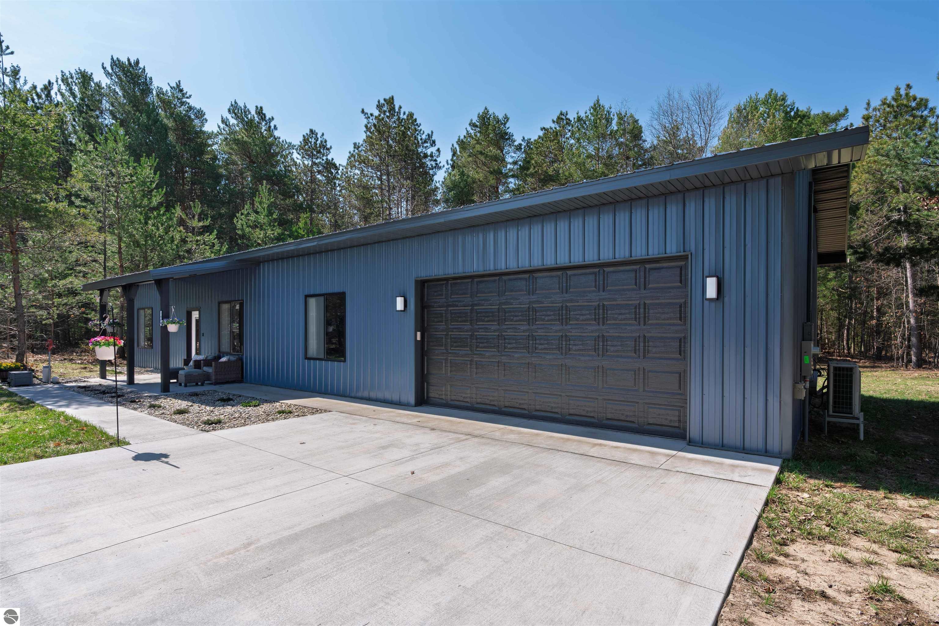 8006 Springwater Drive, Rapid City, MI 49676 — Photo 51