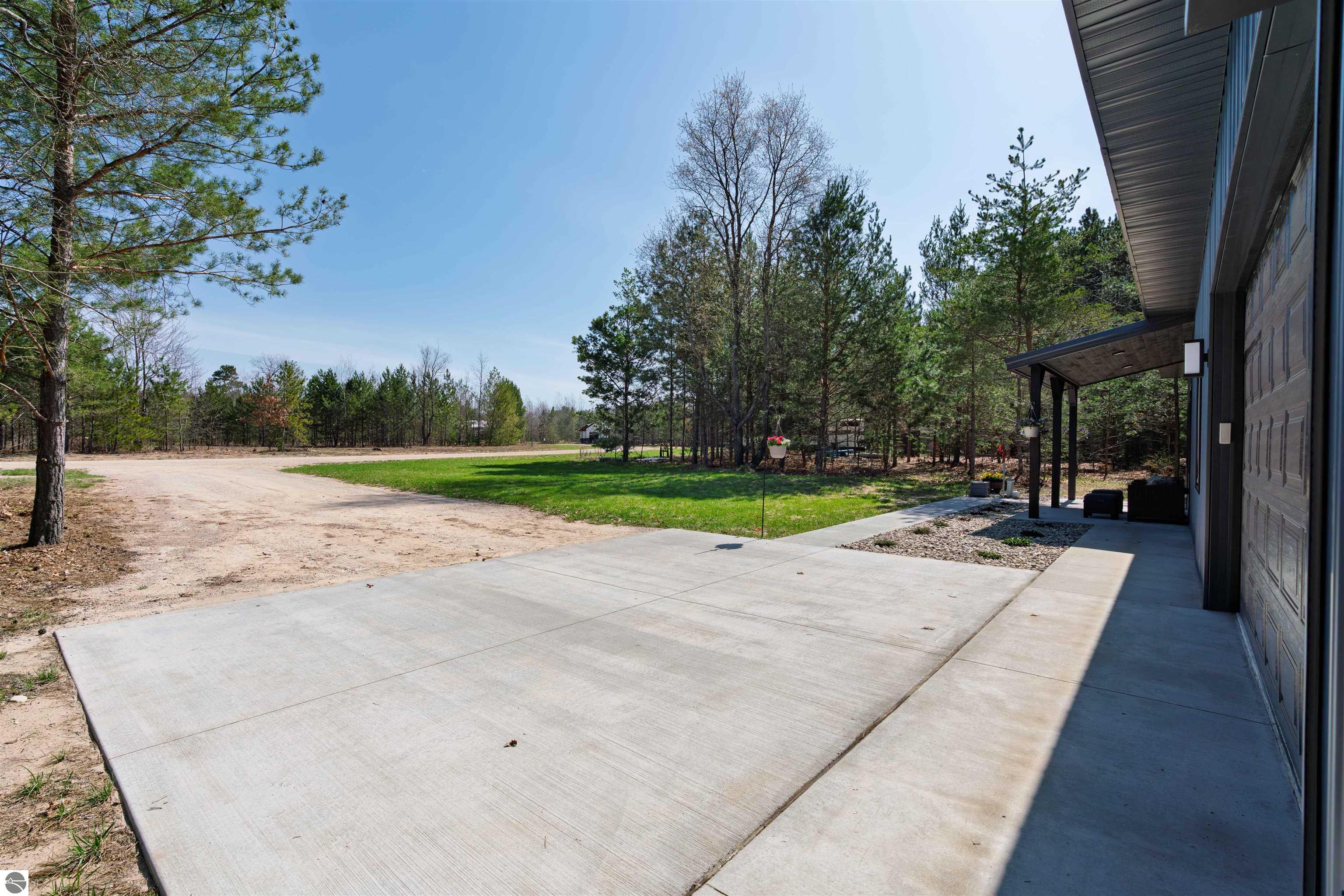 8006 Springwater Drive, Rapid City, MI 49676 — Photo 53
