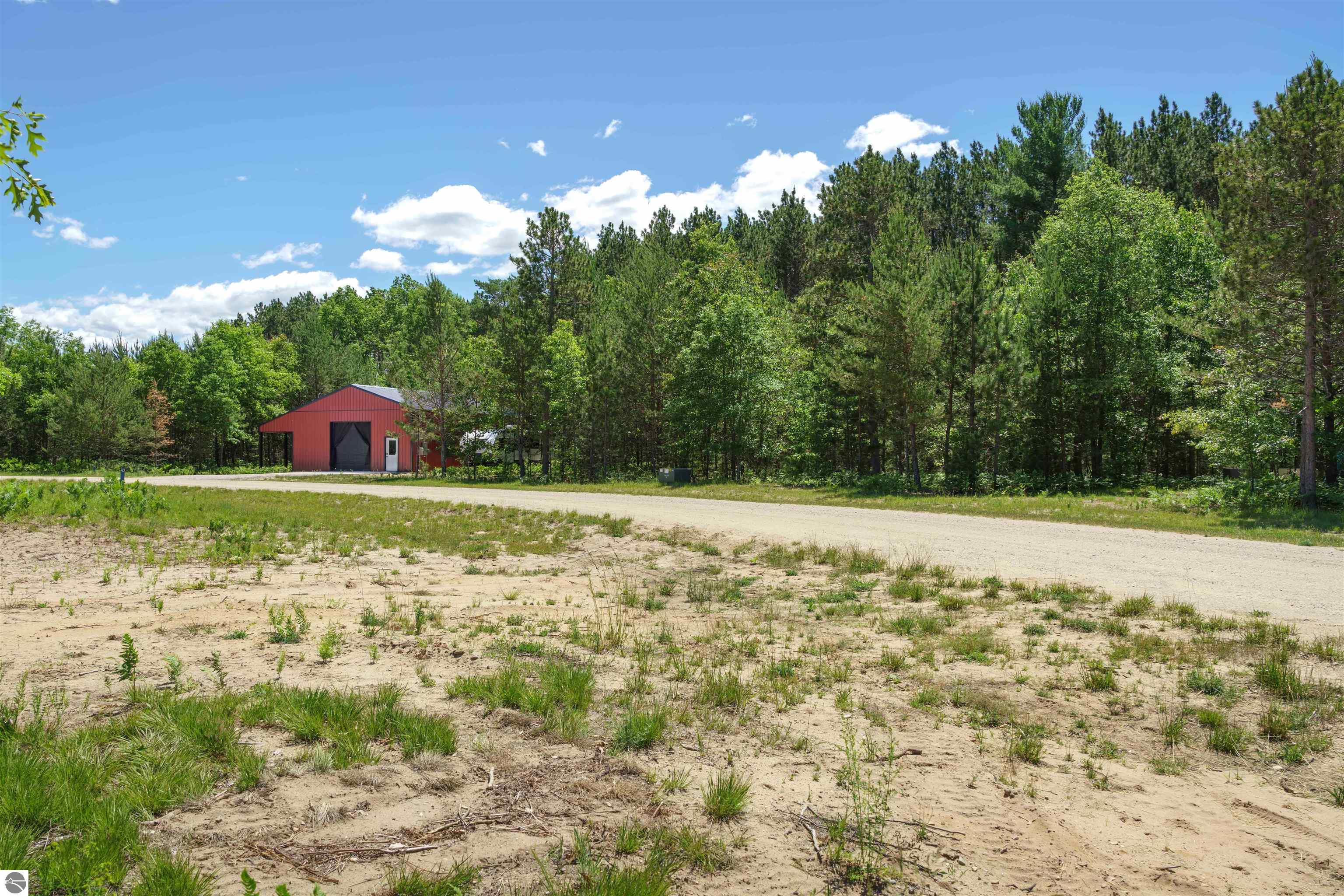 8006 Springwater Drive, Rapid City, MI 49676 — Photo 58