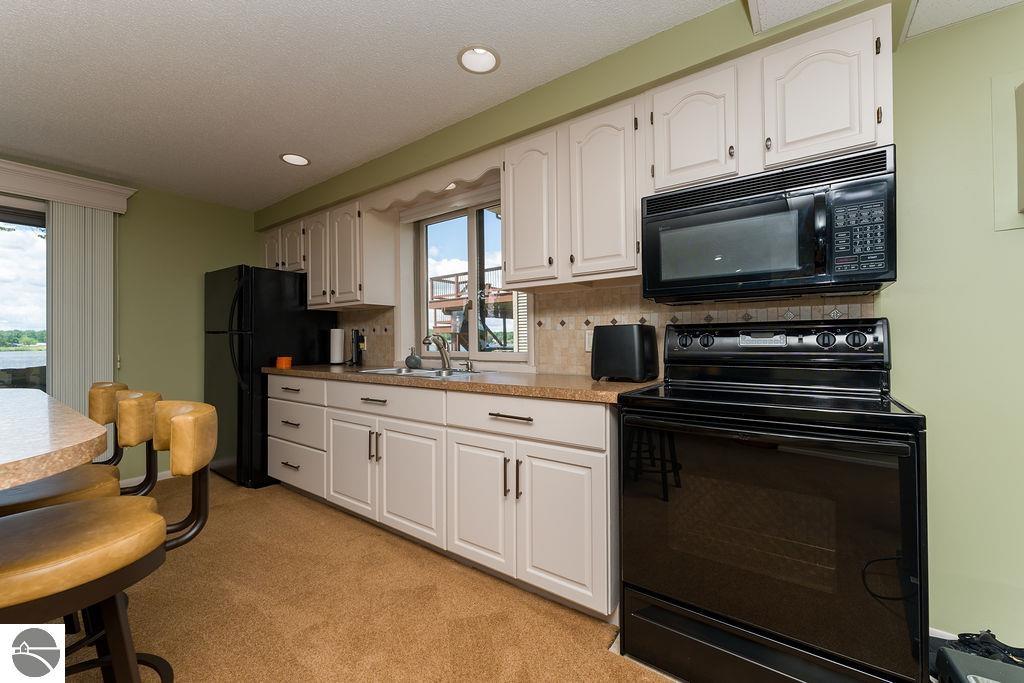 1056 Clubhouse Drive, Lake Isabella, MI 48893 — Photo 59