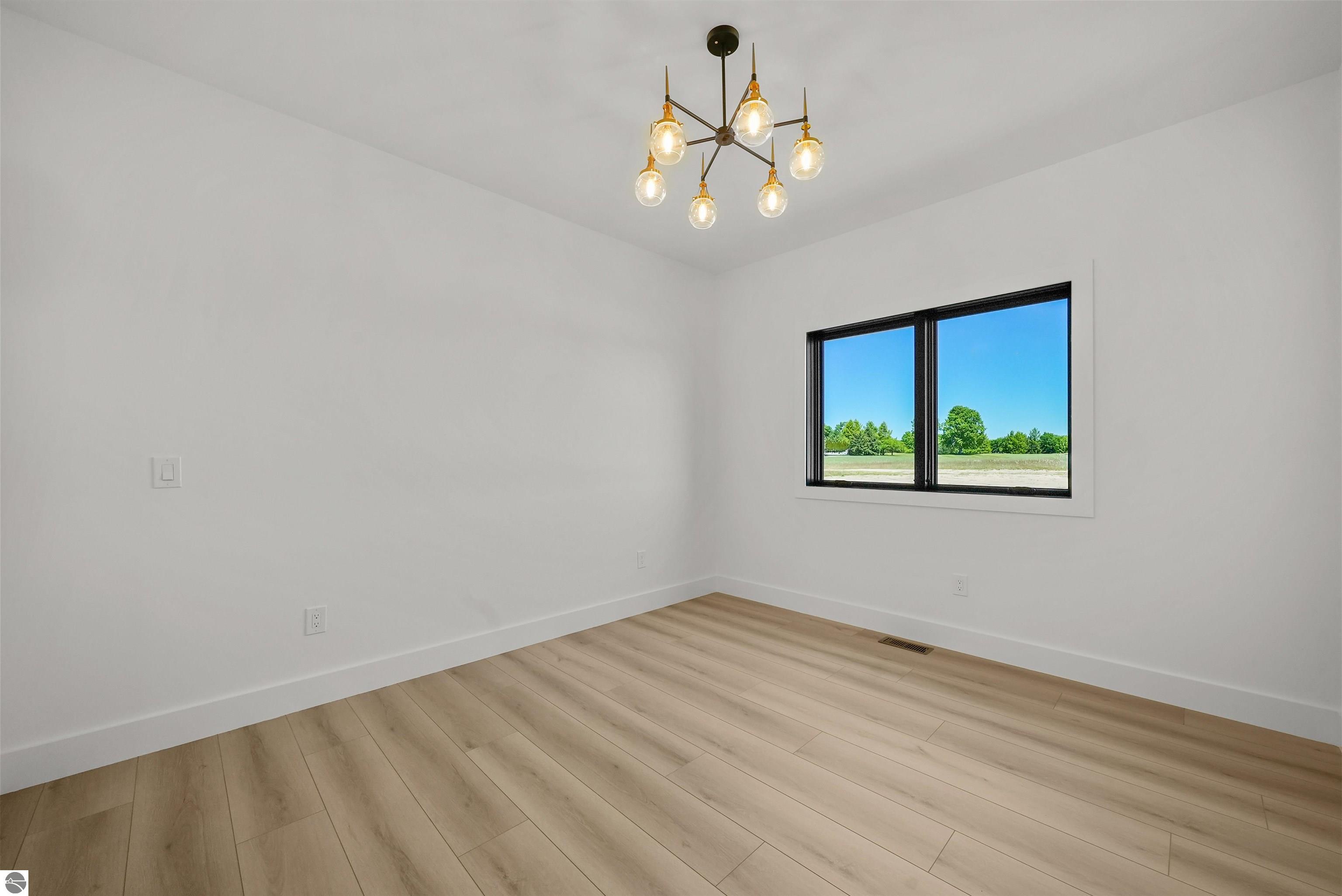 4162 Dornoch Court, Williamsburg, MI 49690 — Photo 32