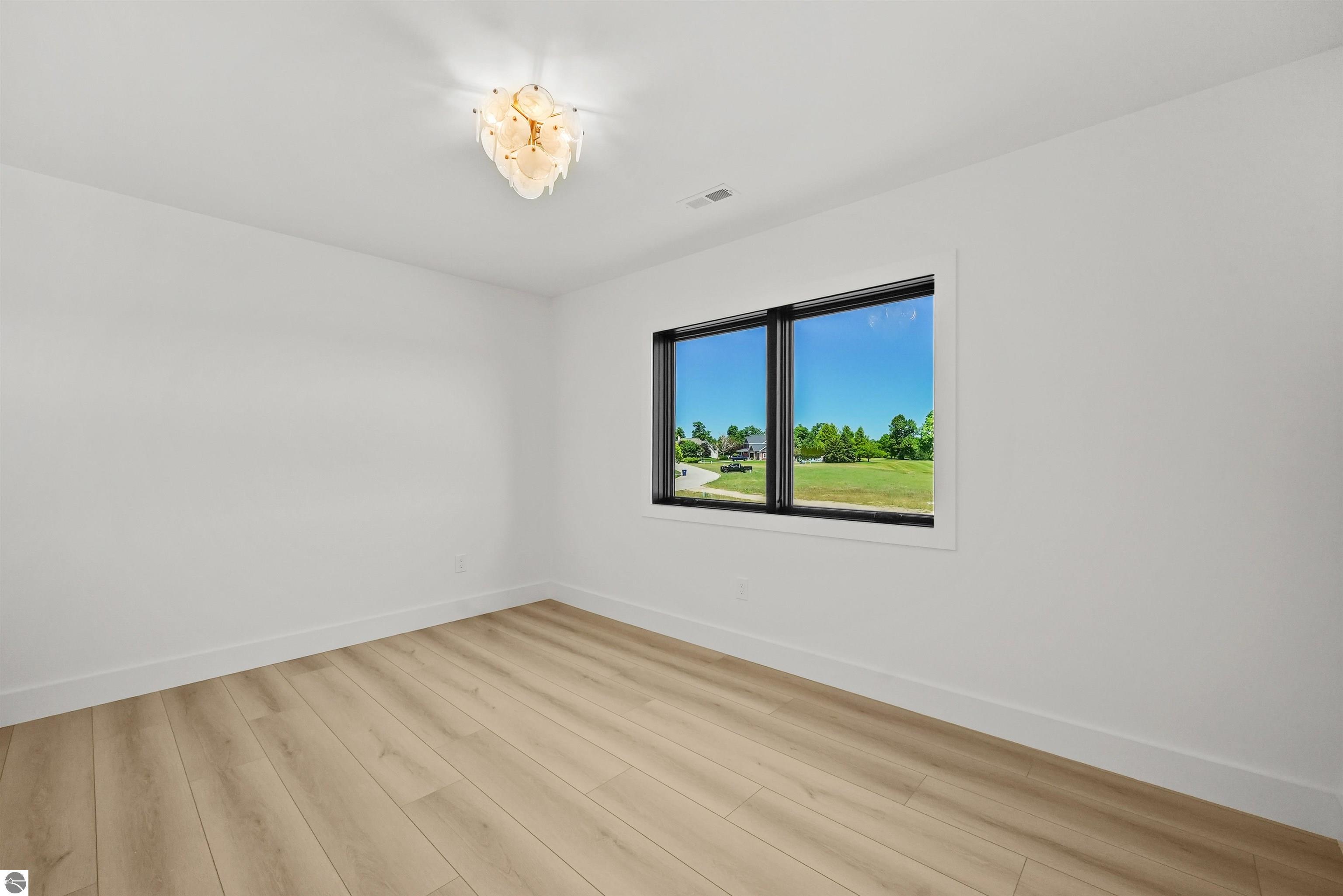 4162 Dornoch Court, Williamsburg, MI 49690 — Photo 46