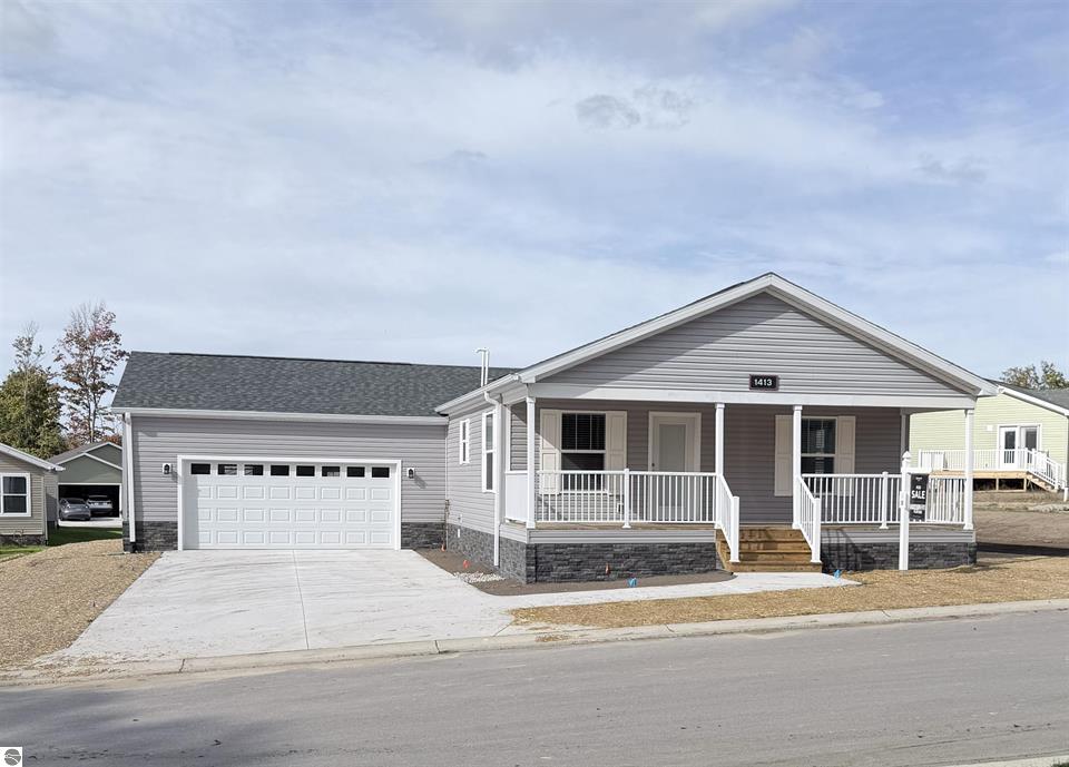 1413 New Horizons Trl, Traverse City, MI, a manufactured home at Alta Vista