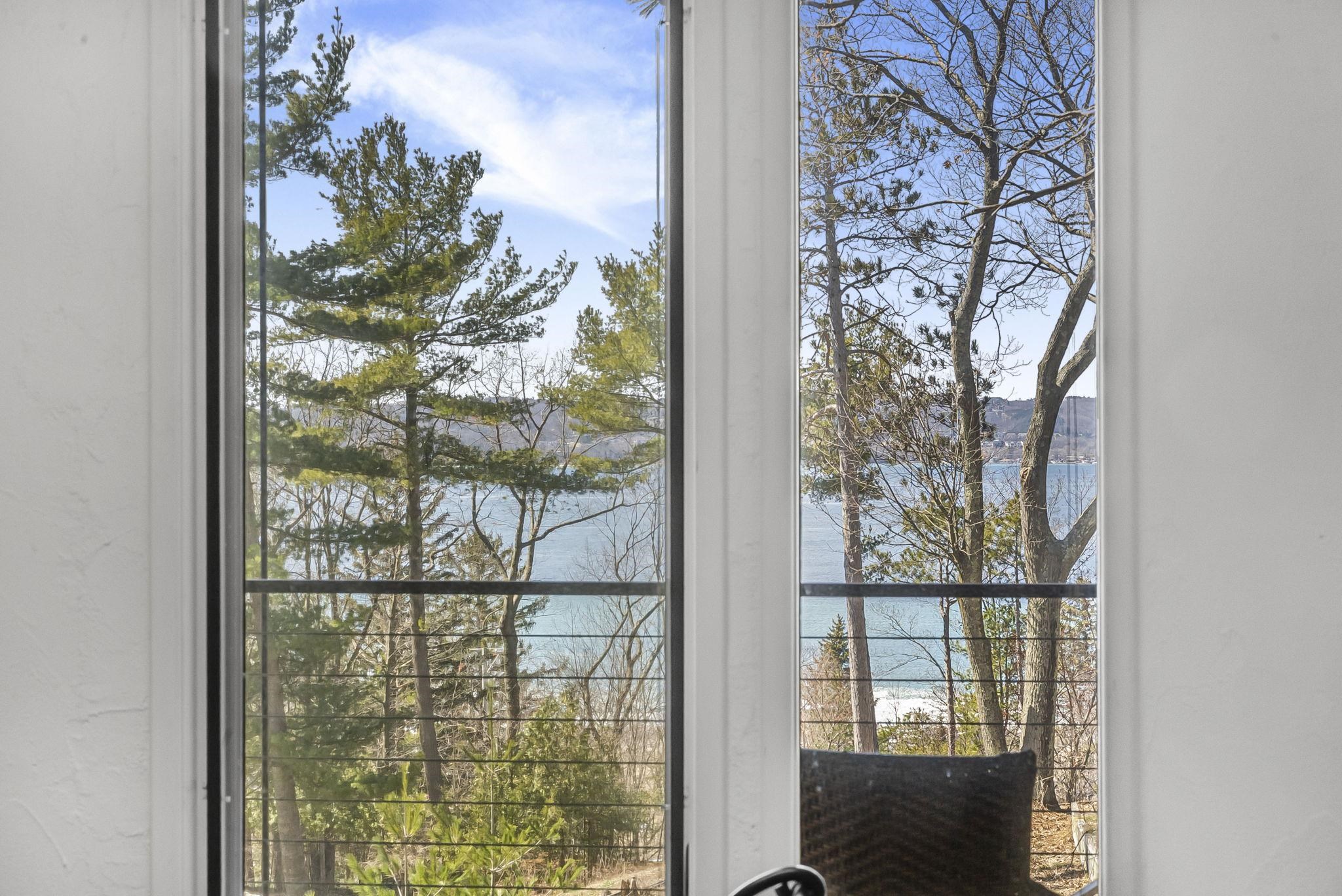 Photo 2 of Single family home for sale at 6644 Peninsula Dr, Traverse City, MI 49686 | MLS# 78080066831 | Listing updated on 2026-10-06