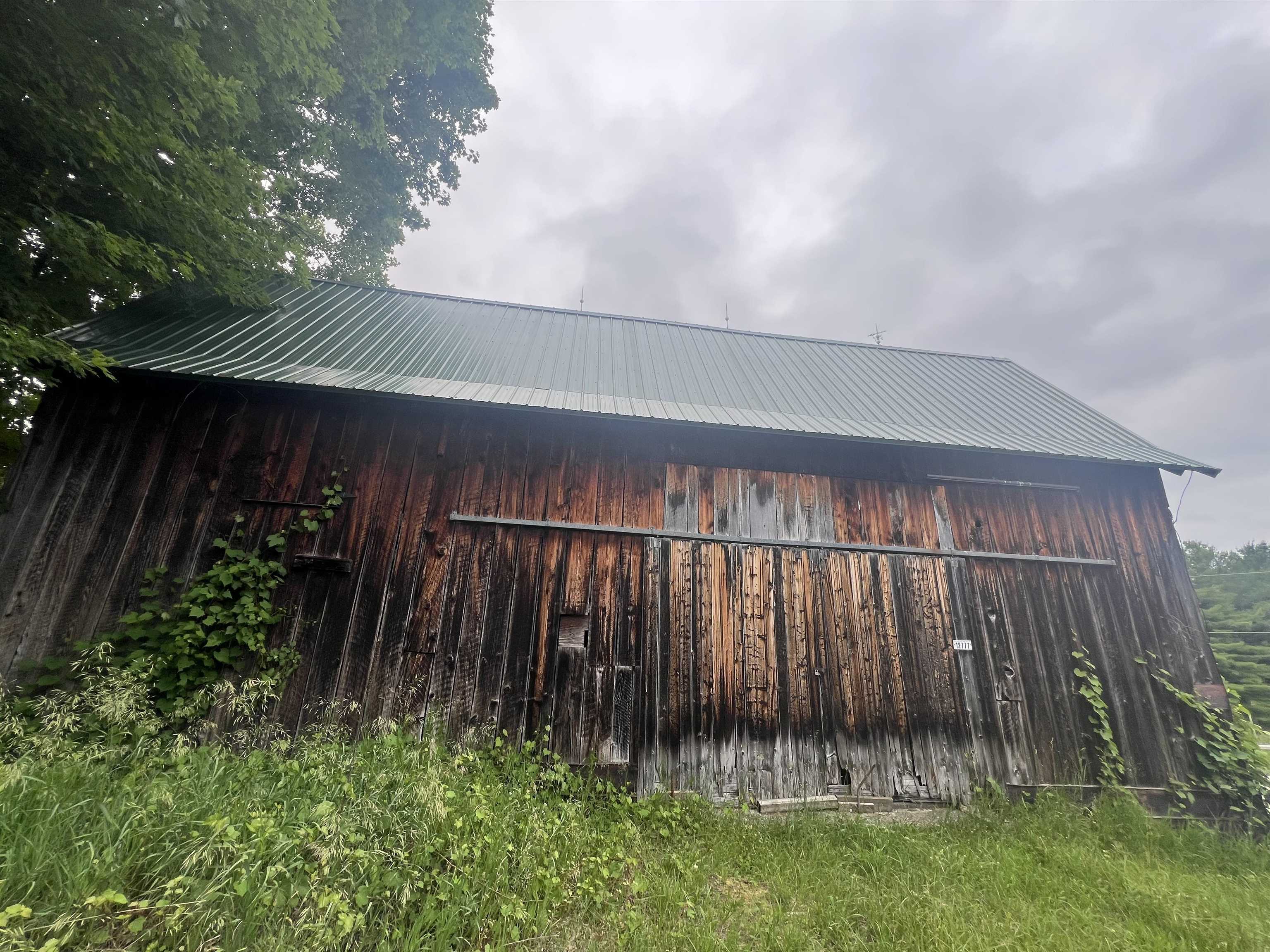 51st image of 12850 Miller Rd, Rapid City, MI 49676 | MLS# 80068044