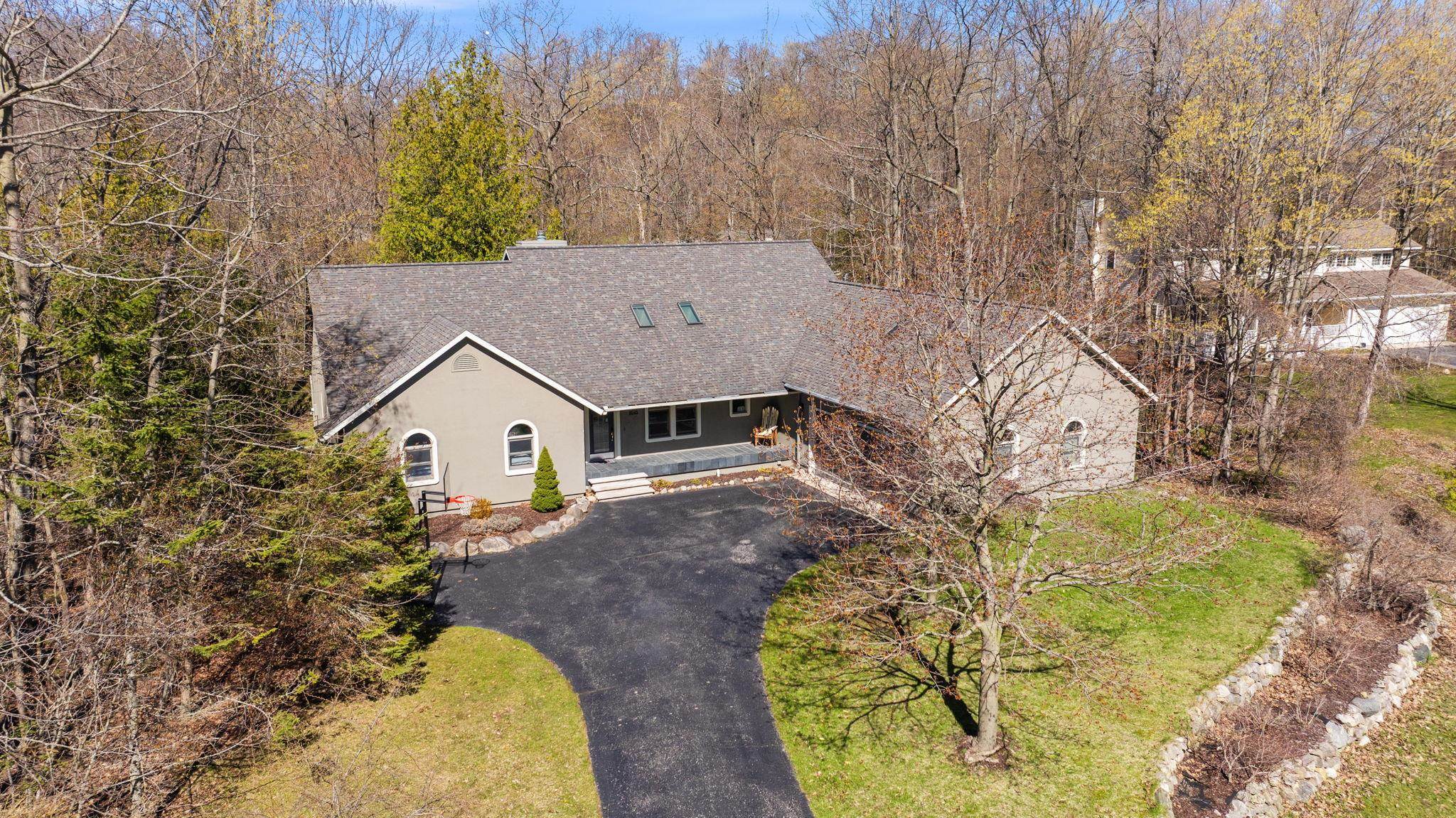 Homes for sale in Charlevoix Township Charlevoix, MI | 9045 North Pointe Woods, Charlevoix Township Charlevoix, MI 49720 | MLS# 78080068386