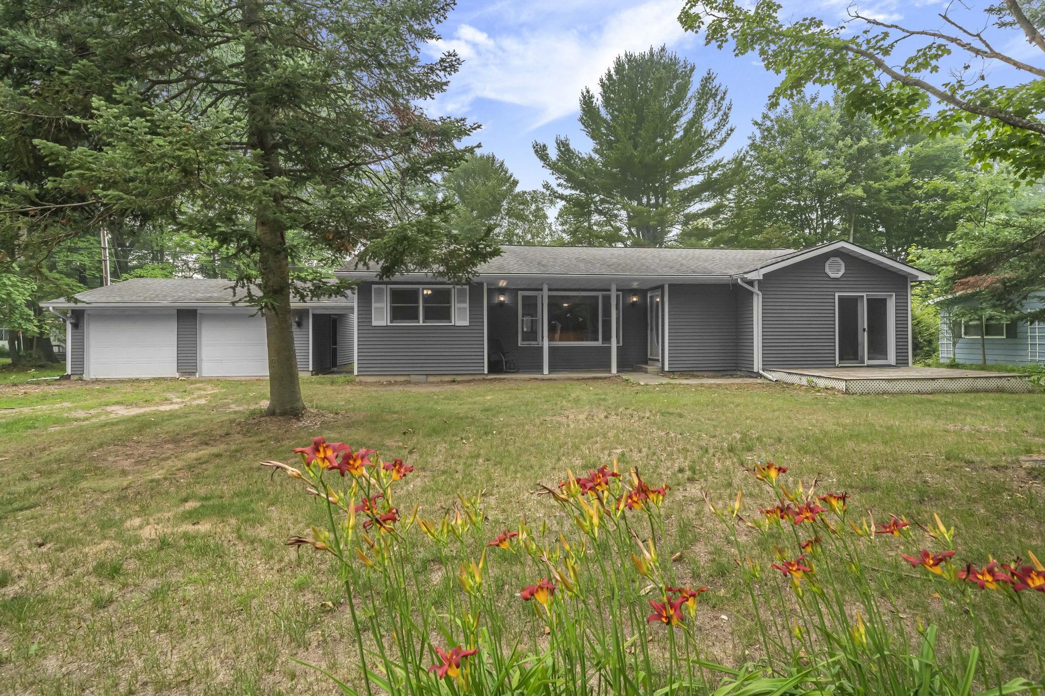 1st image of 6586 Betsie River Rd, Interlochen, MI 49643 | MLS# 80071412