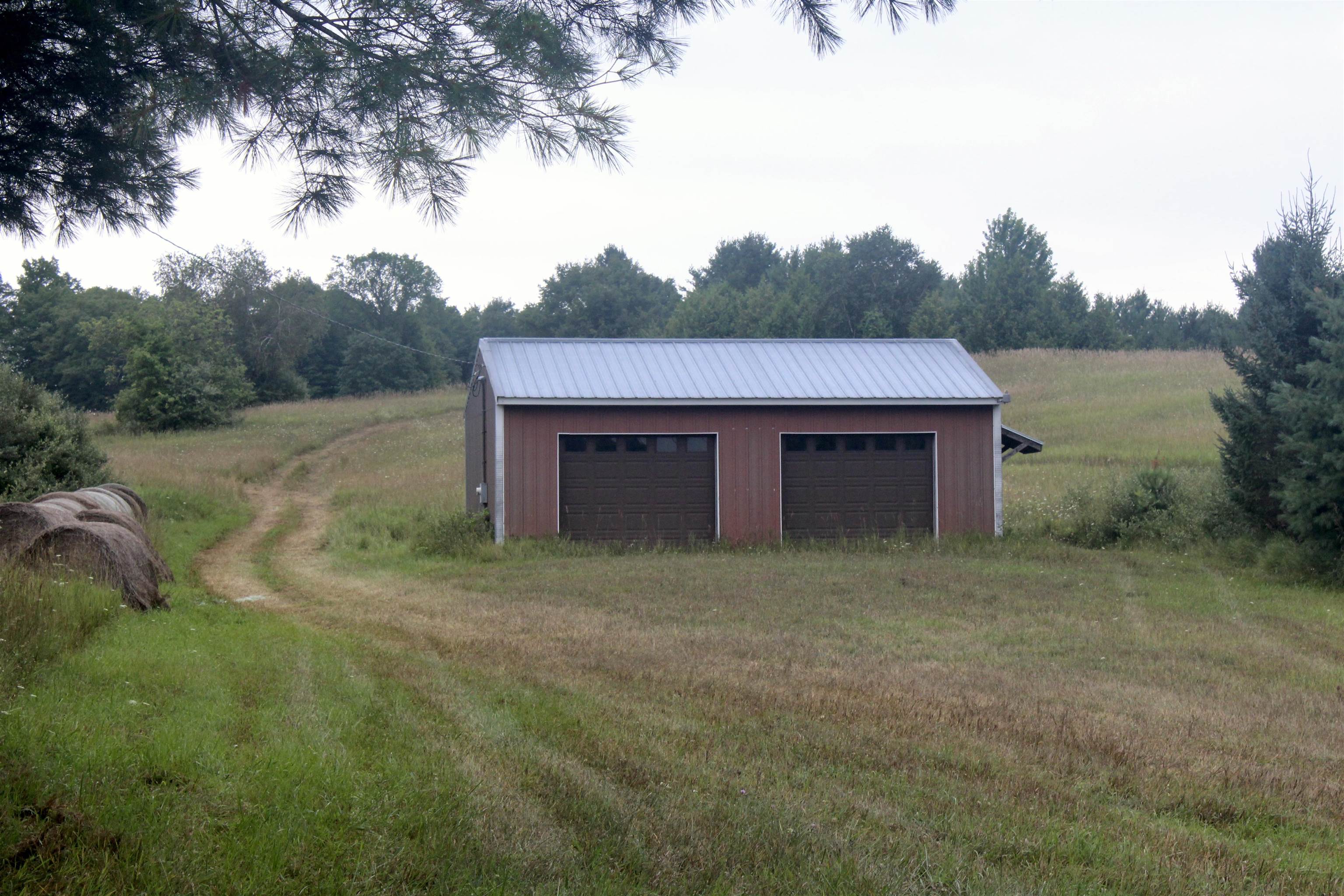 1st image of 0 Barnes Rd, Kewadin, MI 49648 | MLS# 80071742