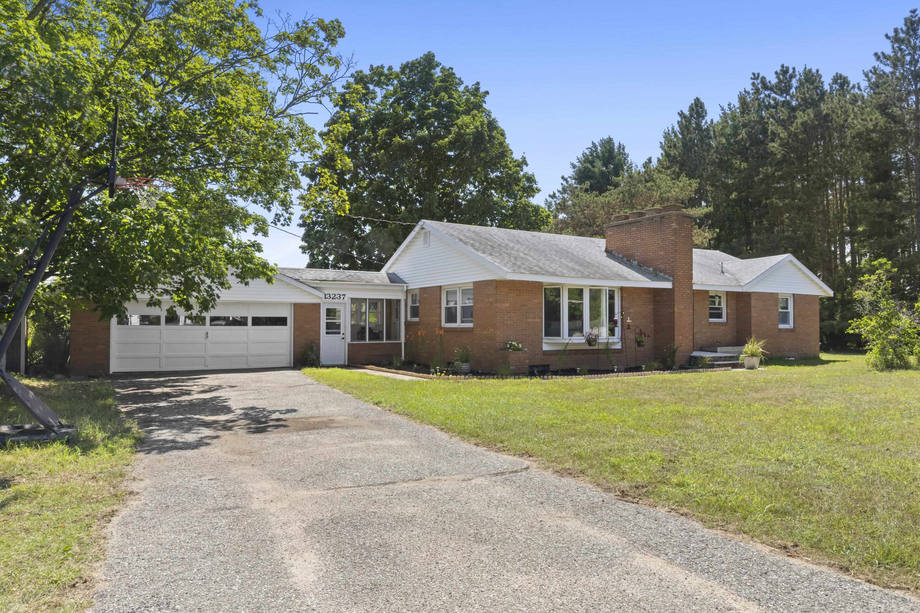 1st image of 13237 Honor Hwy, Beulah, MI 49617 | MLS# 80071762
