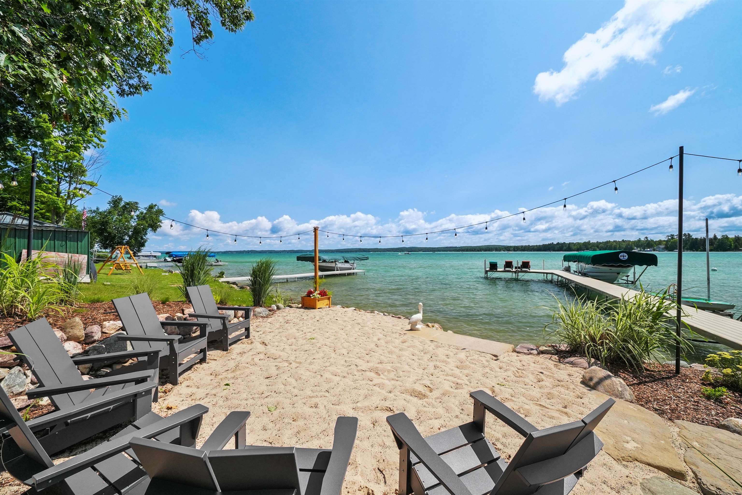 1st image of 12344 S West Torch Lake Dr, Rapid City, MI 49676 | MLS# 80071911