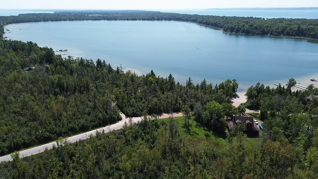 1st image of 14222 Birch Pointe Dr, Kewadin, MI 49648 | MLS# 80072010