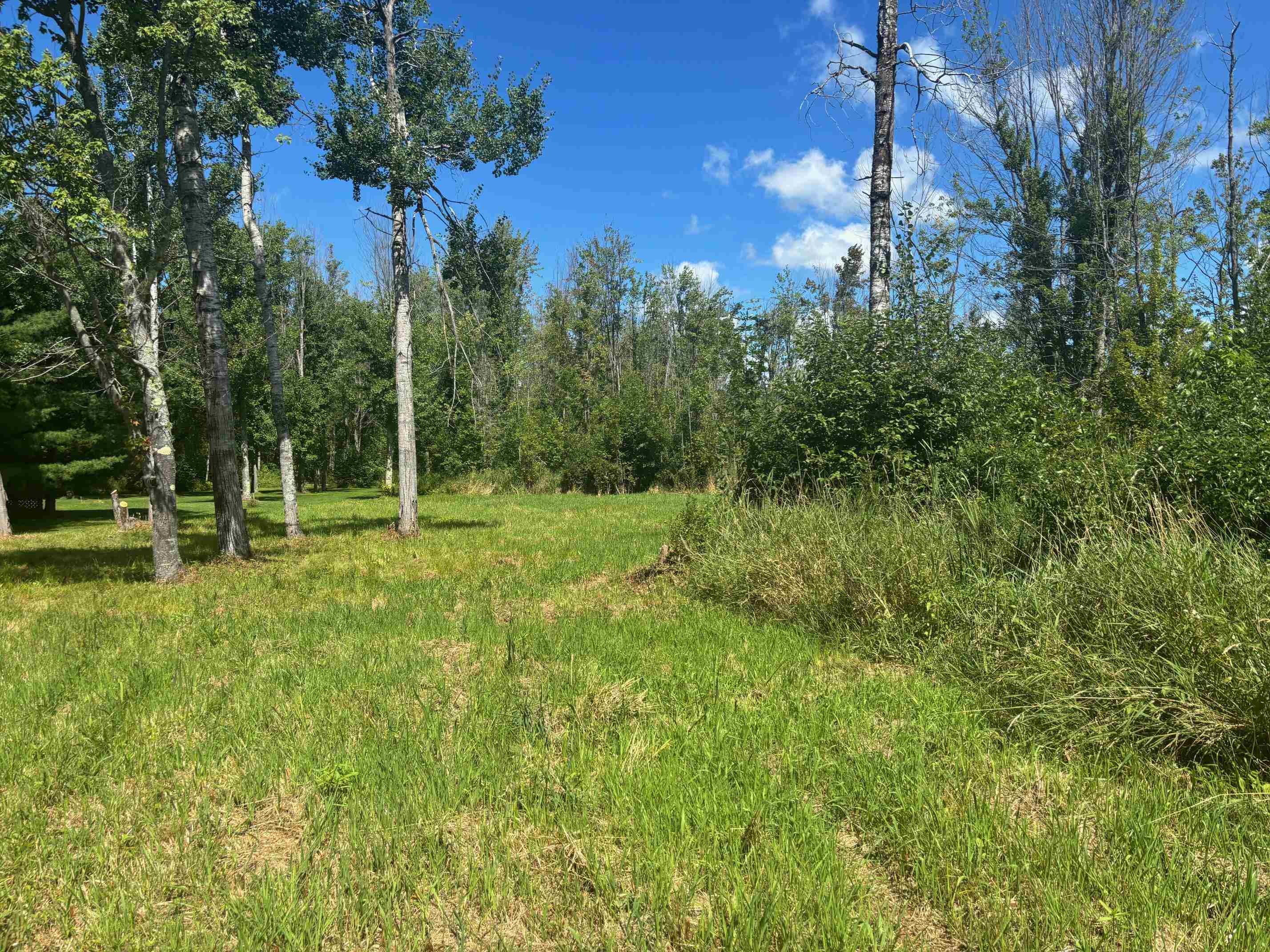2nd image of 14222 Birch Pointe Dr, Kewadin, MI 49648 | MLS# 80072010