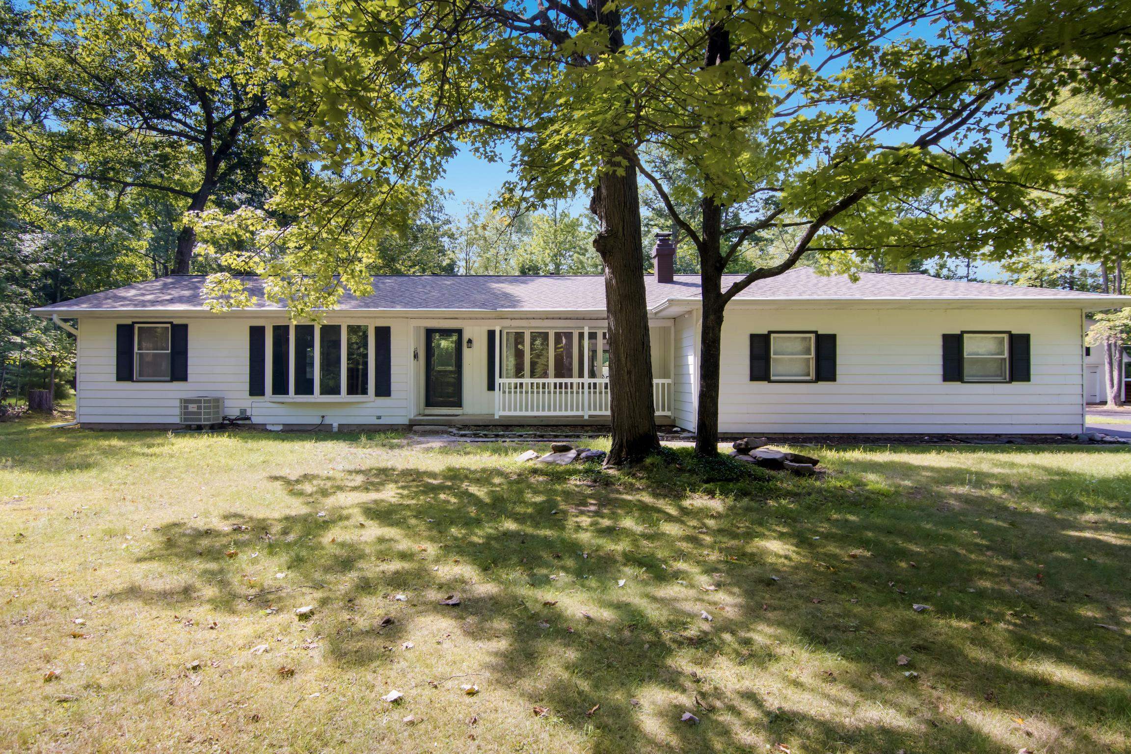 1st image of 5896 Betsie River Rd, Interlochen, MI 49643 | MLS# 80072713