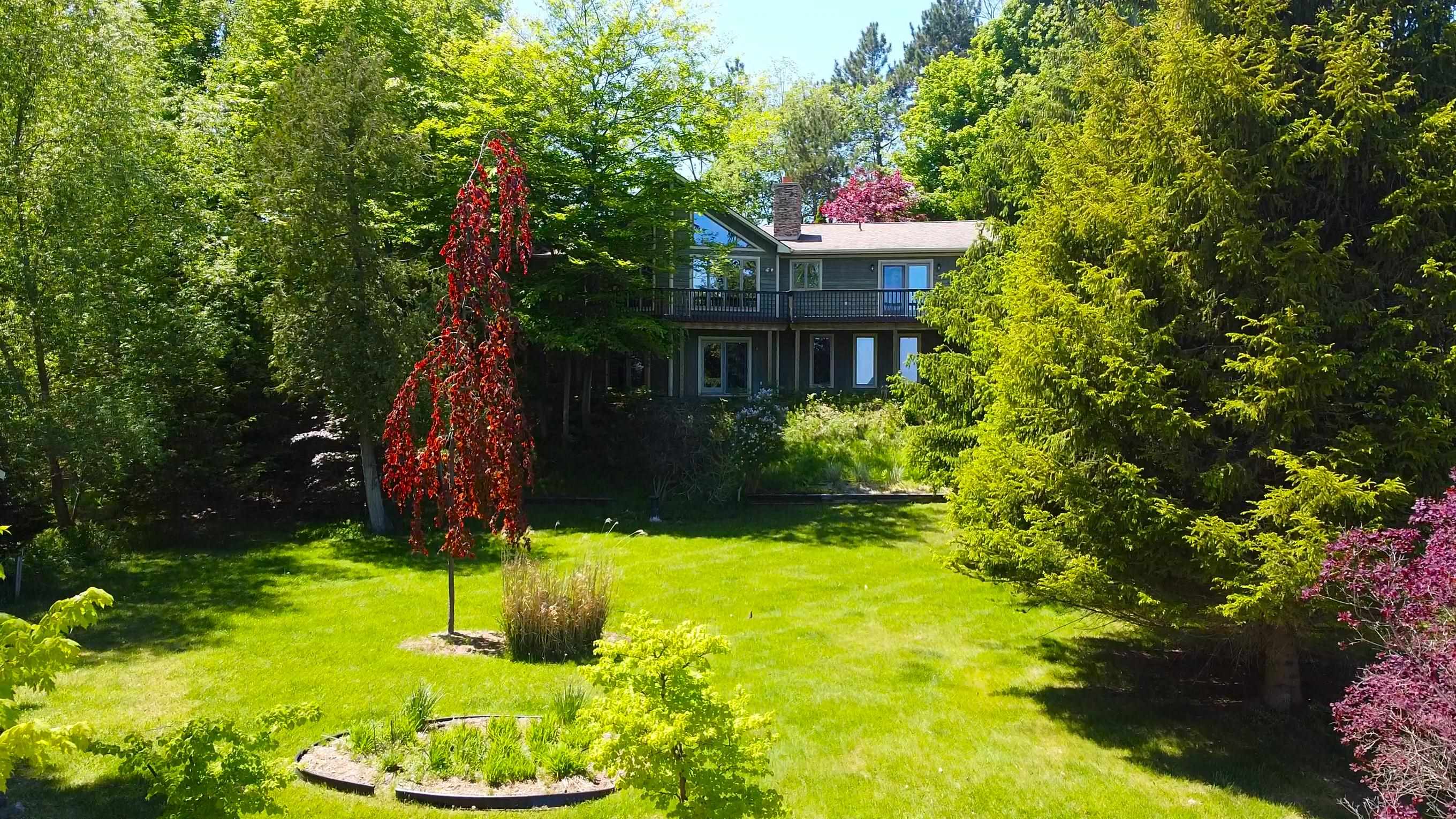1st image of 2337 Nw Torch Lake Dr, Kewadin, MI 49648 | MLS# 80072787
