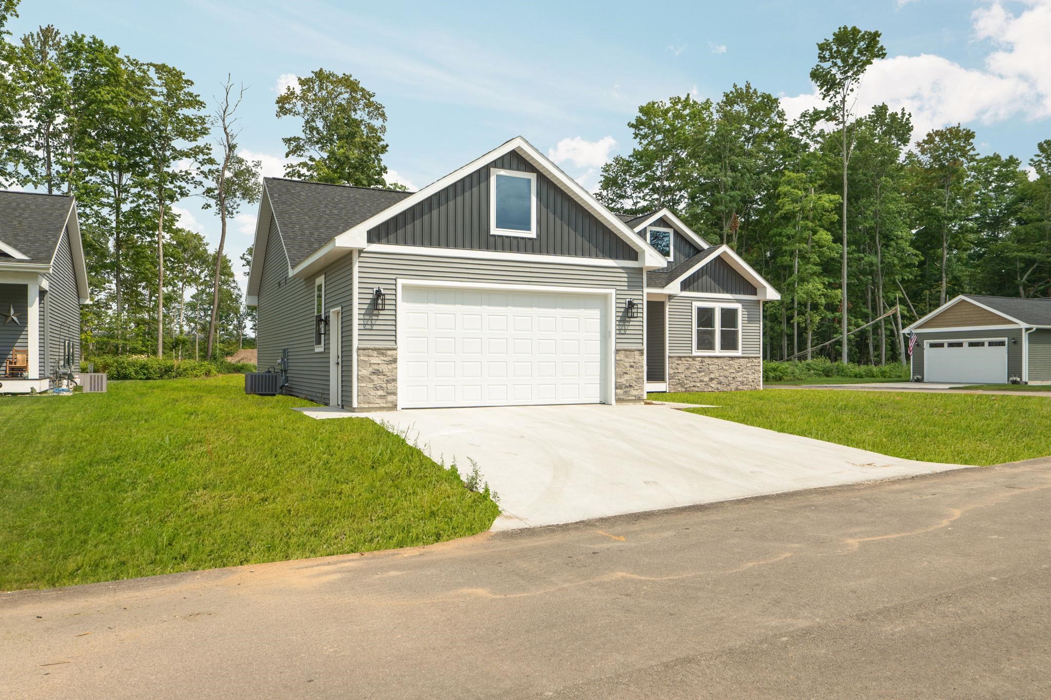 Photo 1 of Single family home for sale at 2207 Cottonwood Ave, Grawn, MI 49637 | MLS# 80073507 | Listing updated on 2026-09-17