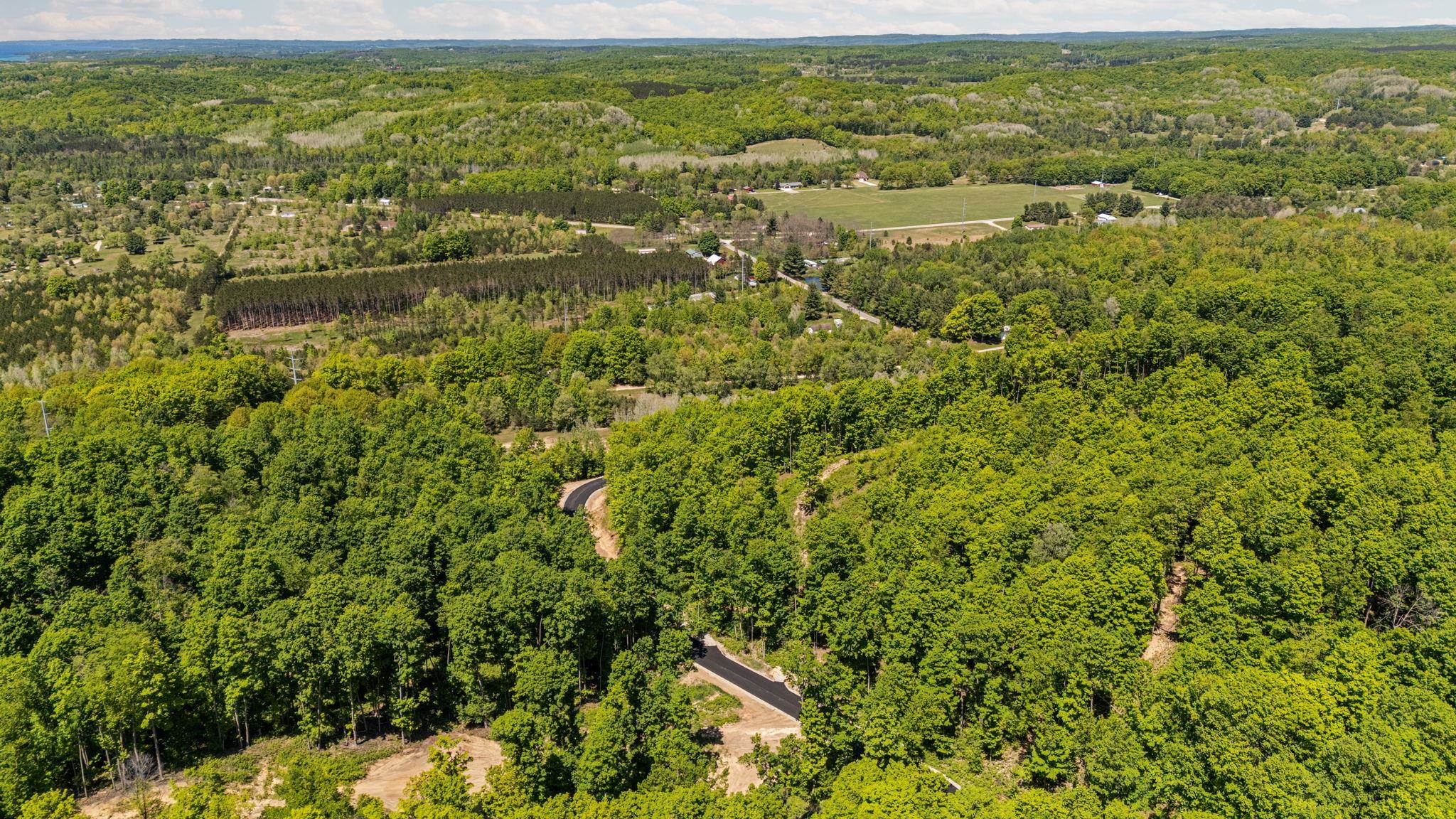 Photo 2 of Land for sale at 2255 Acres Retreats Way, Rapid City, MI 49676 | MLS# 80073590 | Listing updated on 2026-09-16