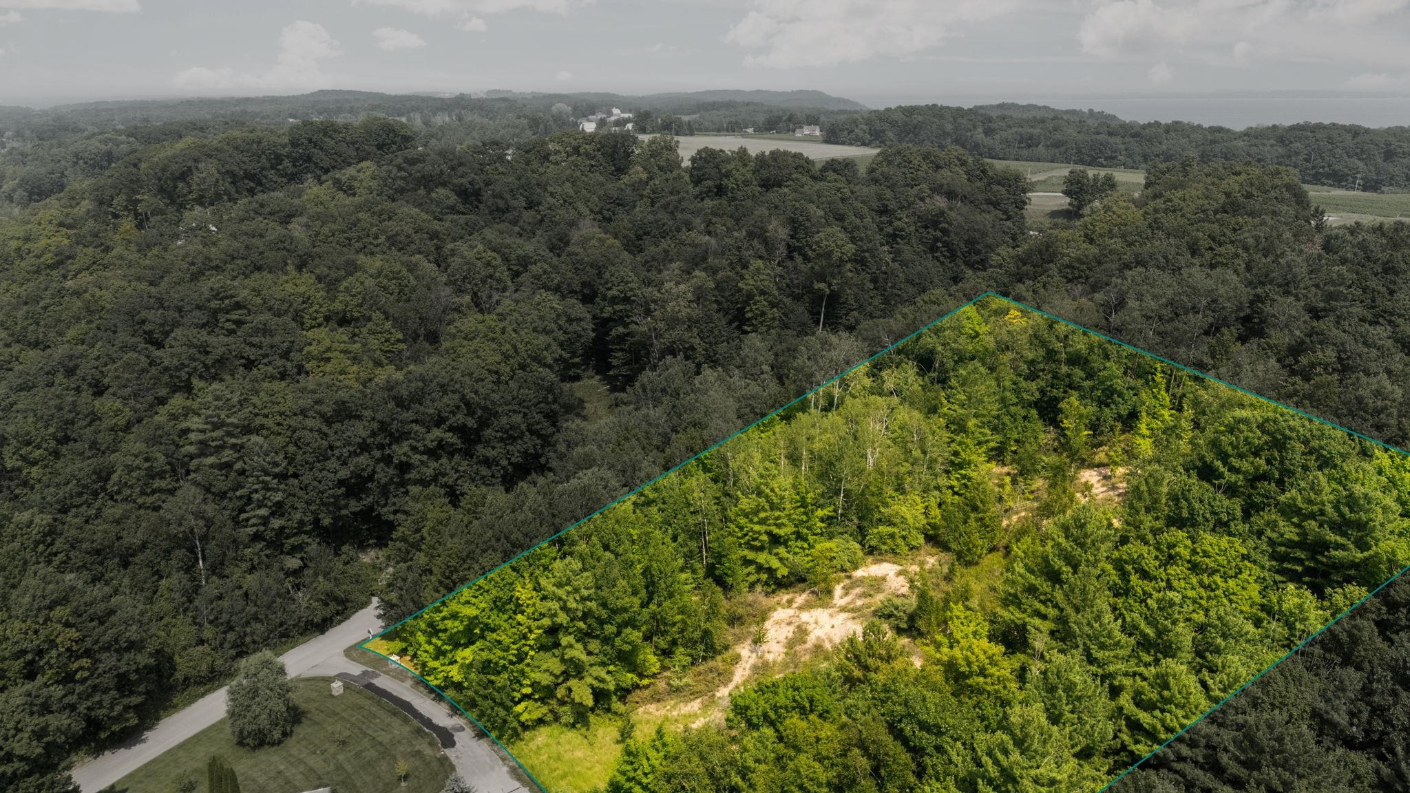 Photo 3 of Land for sale at Part Of 1000 Camino Maria, Traverse City, MI 49686 | MLS# 78080073704 | Listing updated on 2026-09-21