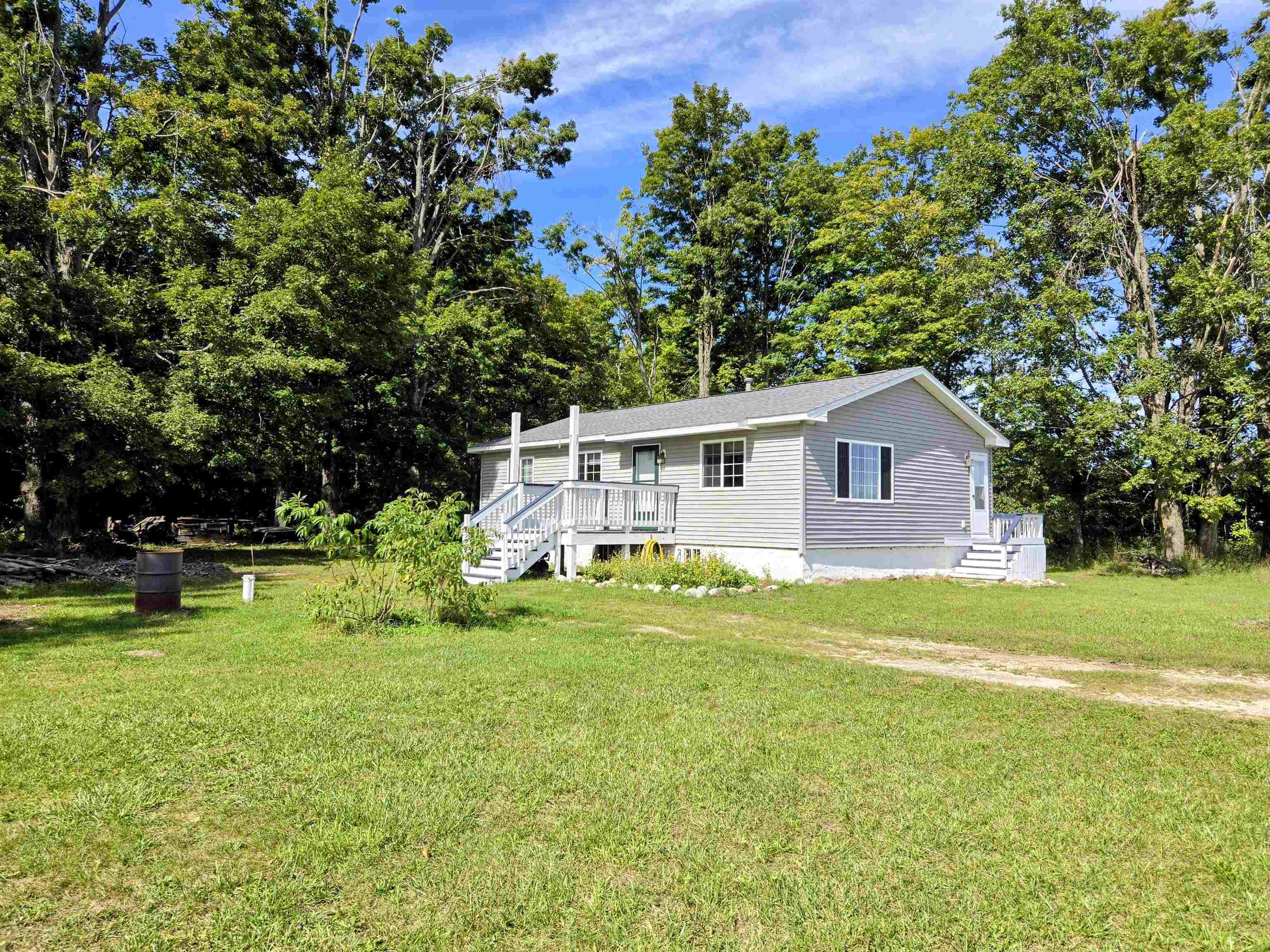 Photo 2 of Single family home for sale at 8522 Bocook Rd, Mancelona, MI 49659 | MLS# 78080073727 | Listing updated on 2026-09-22