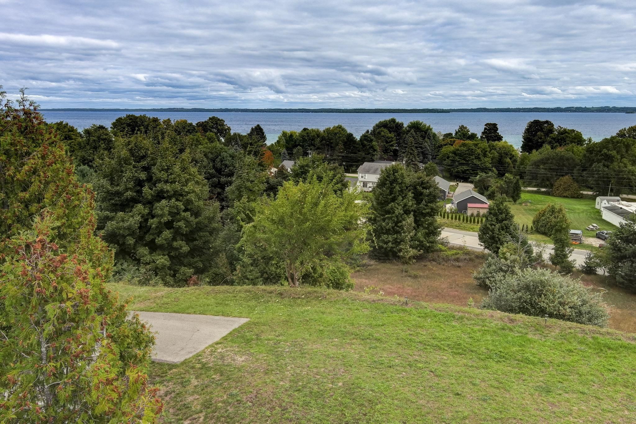 Photo 2 of Single family home for sale at 5859 S Bridget Rose Ln, Suttons Bay, MI 49682 | MLS# 78080073832 | Listing updated on 2026-09-25