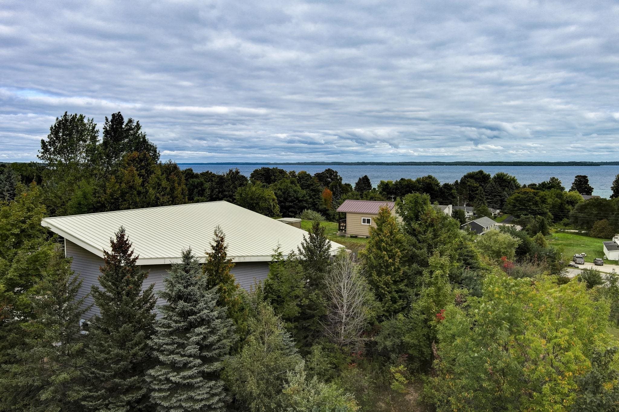 Photo 3 of Single family home for sale at 5859 S Bridget Rose Ln, Suttons Bay, MI 49682 | MLS# 78080073832 | Listing updated on 2026-09-25