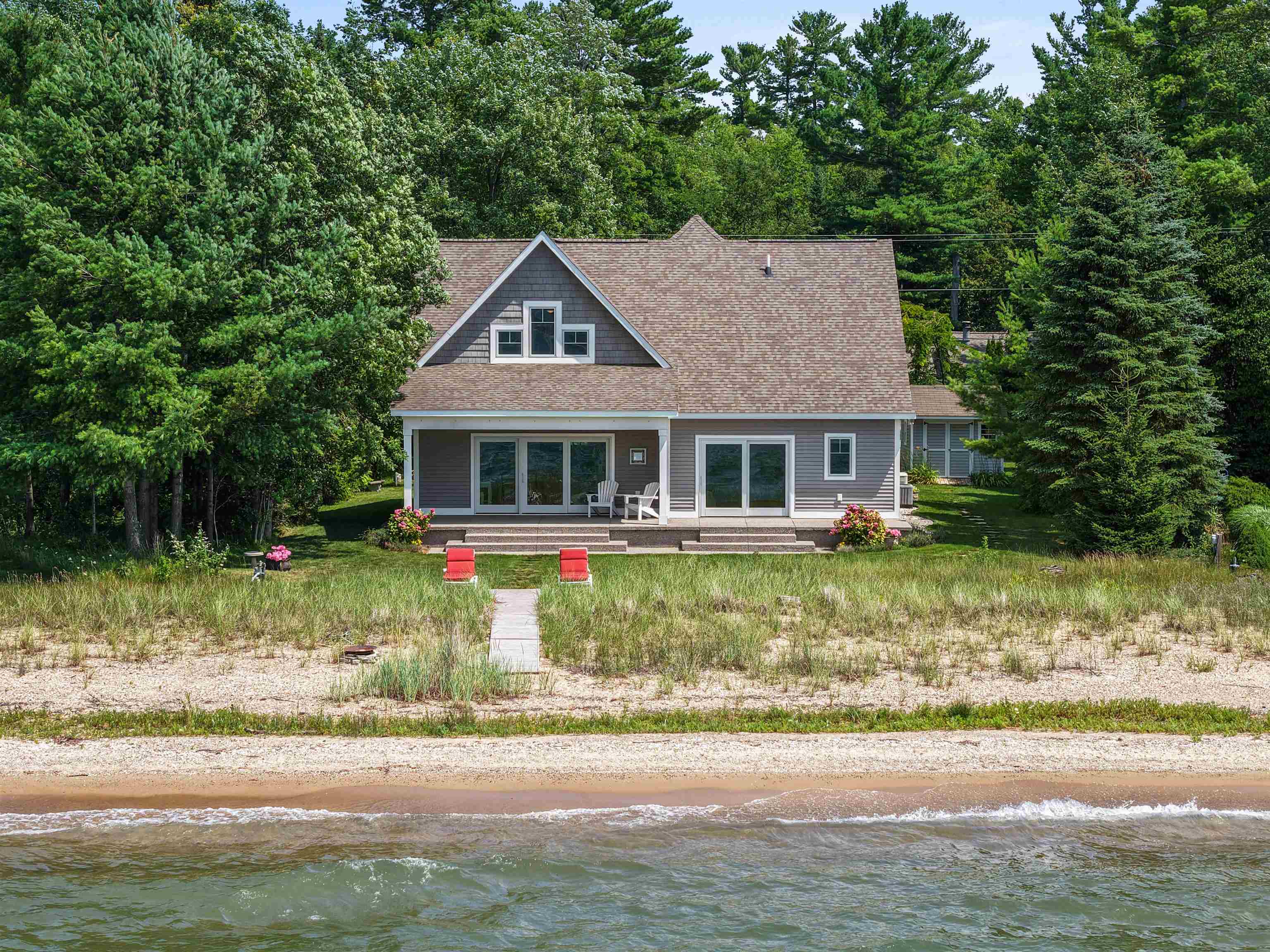Photo 1 of Single family home for sale at 6557 Deepwater Point Rd, Williamsburg, MI 49690 | MLS# 78080074013 | Listing updated on 2026-10-01