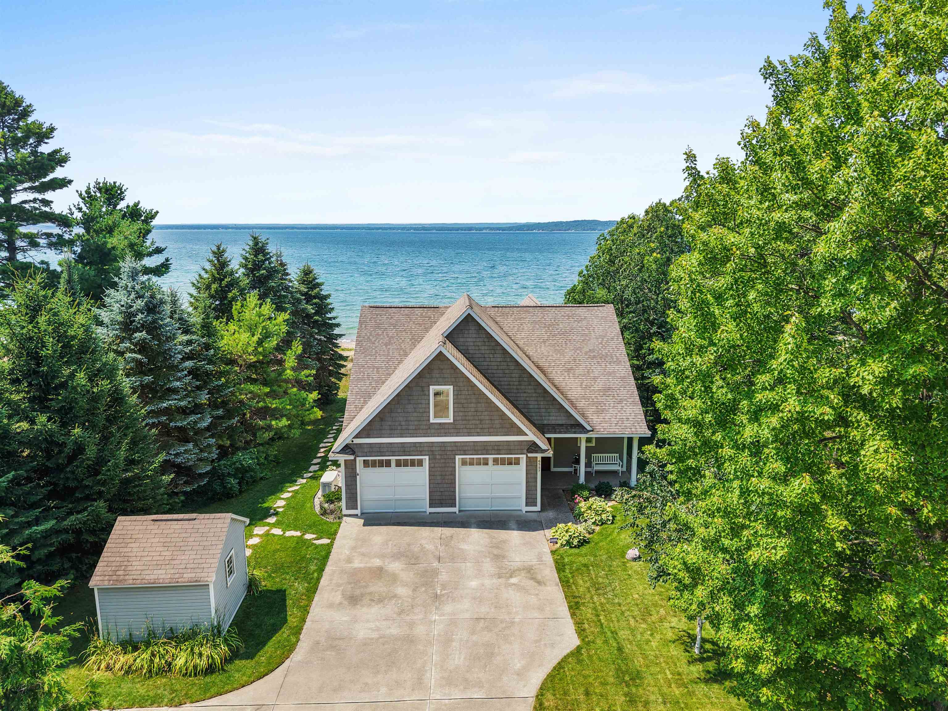 Photo 3 of Single family home for sale at 6557 Deepwater Point Rd, Williamsburg, MI 49690 | MLS# 78080074013 | Listing updated on 2026-10-01